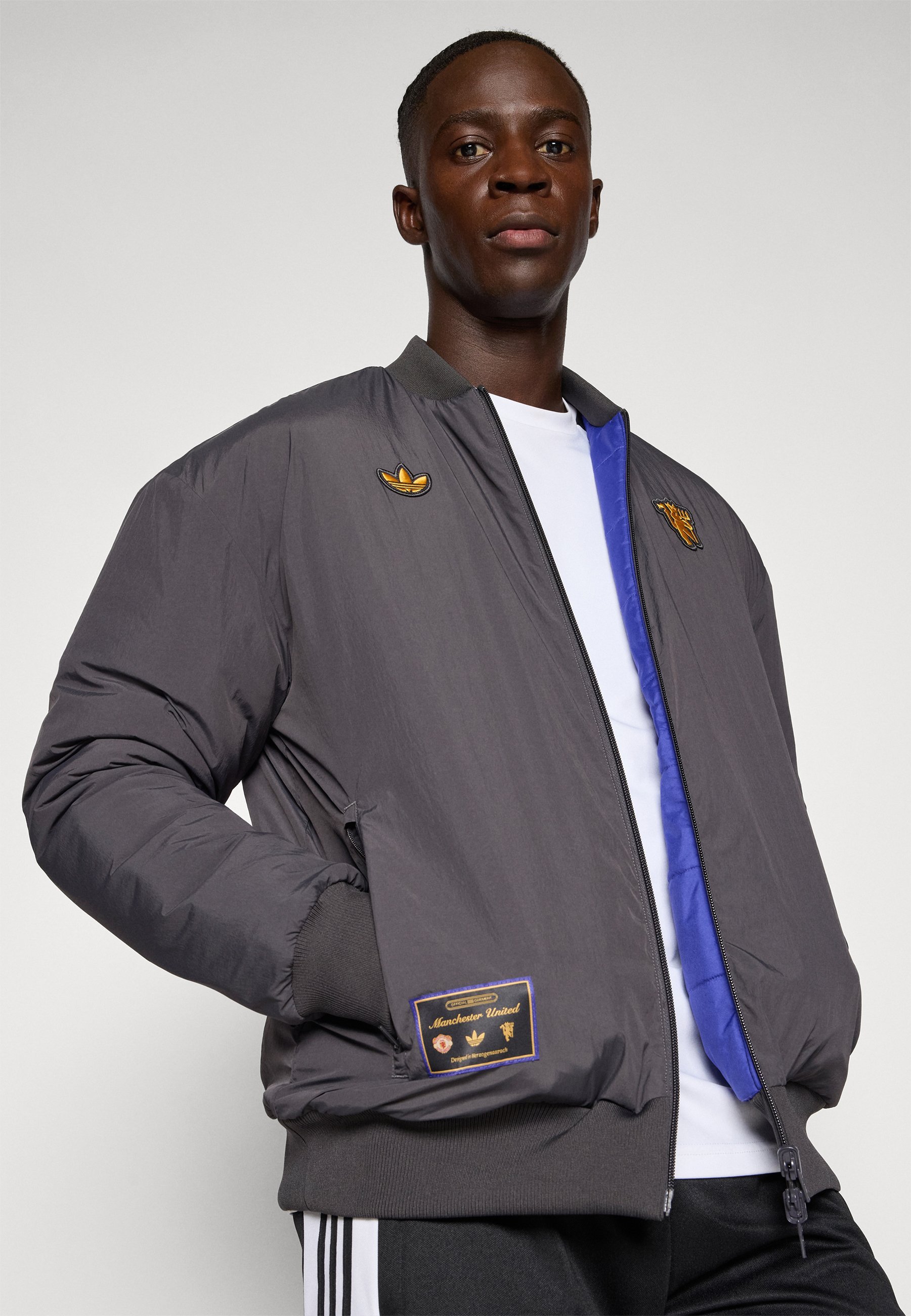 Giacca adidas Originals MANCHESTER UNITED ICON - Giacca invernale - nero utility/semi night flash