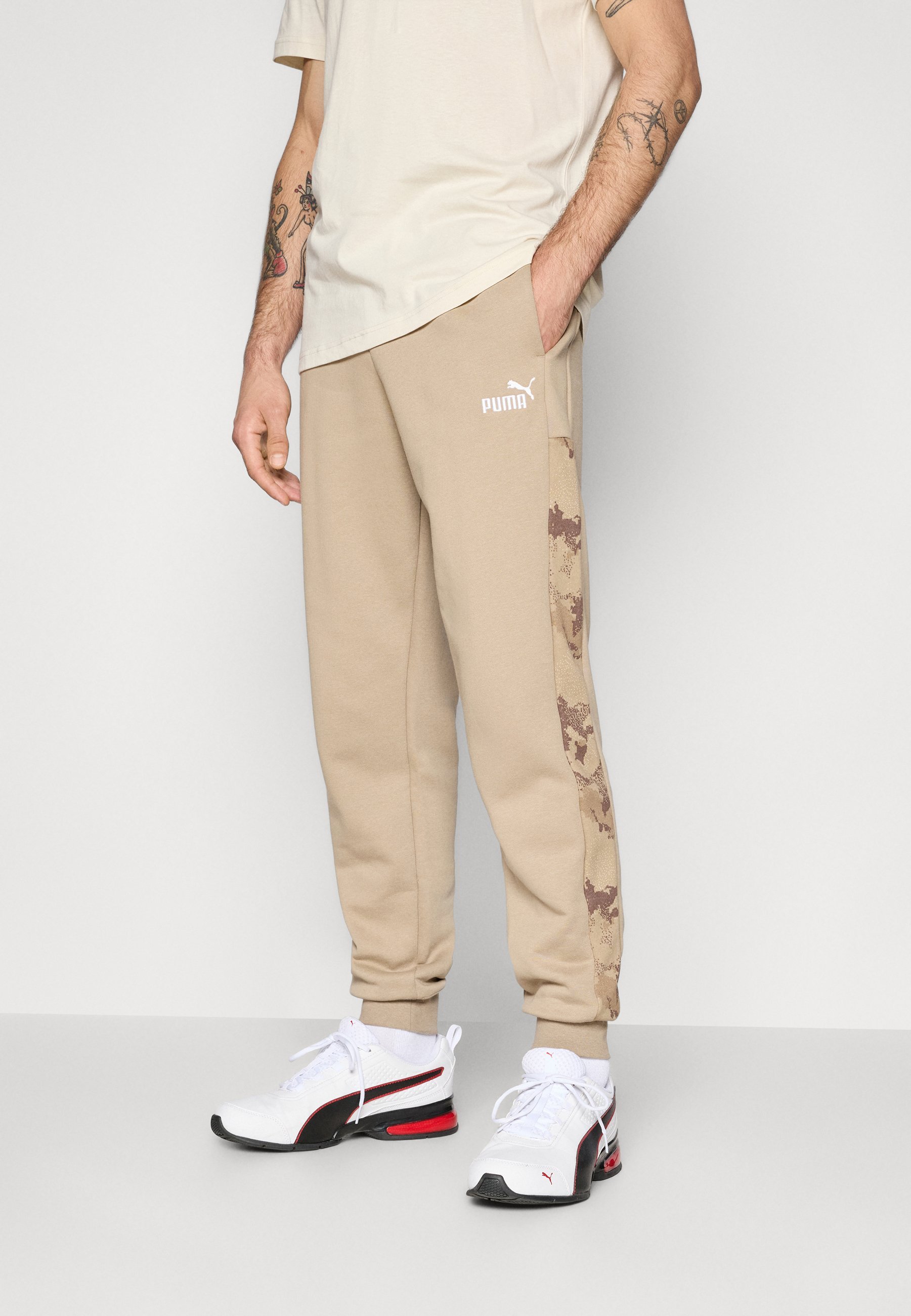 Pantalon de survêtement Puma CAMO - café glacé