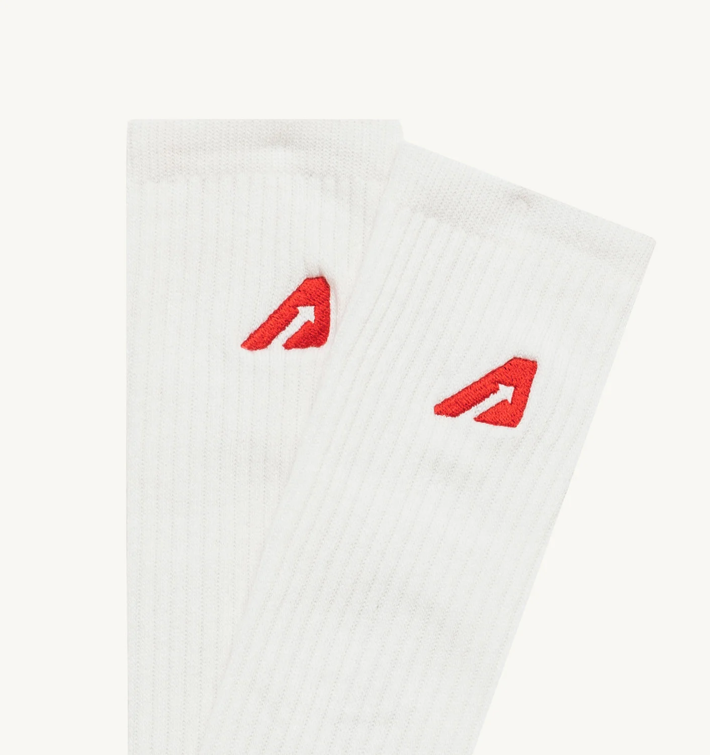 Norsunluunvärinen logosukka