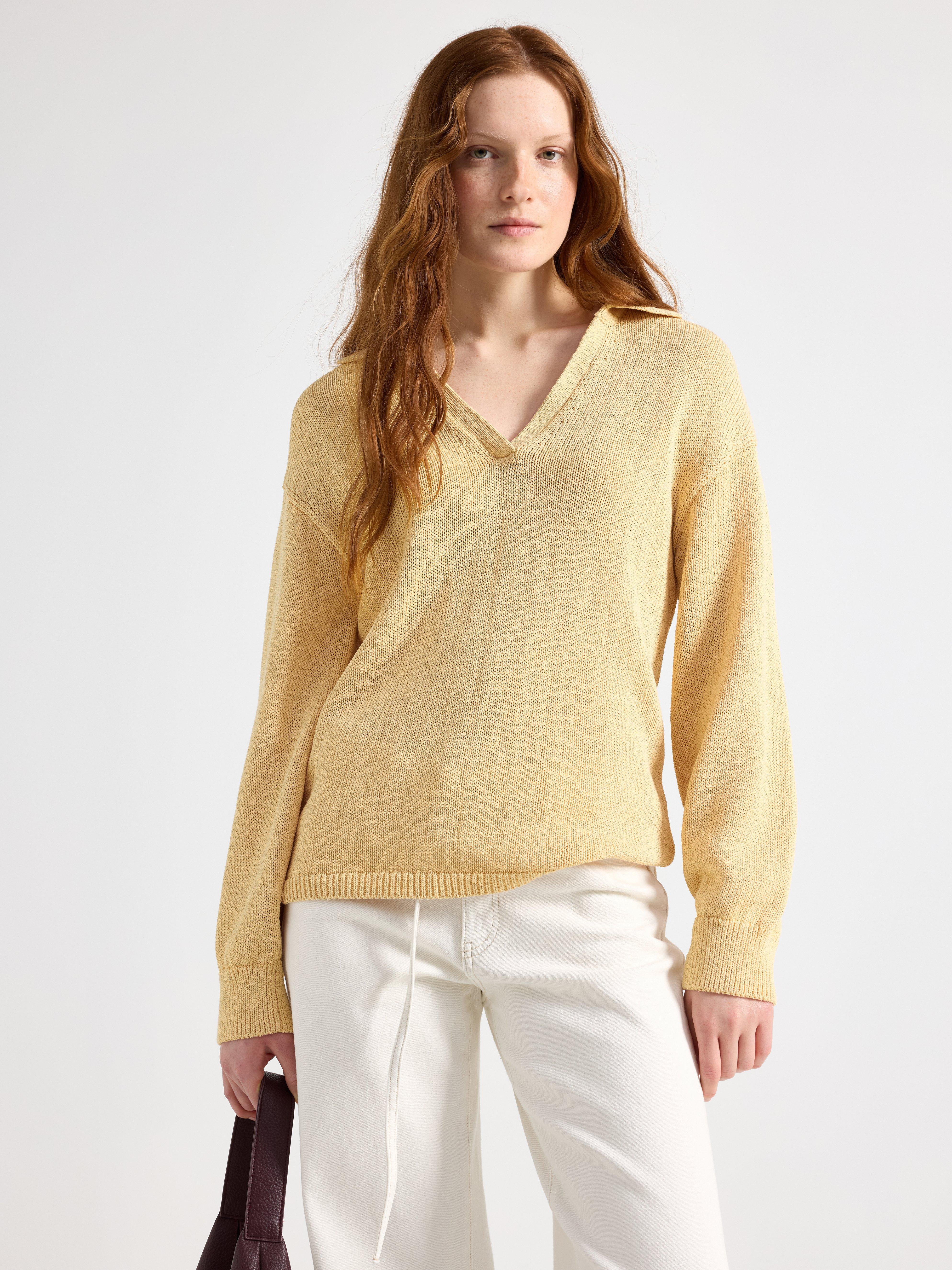 Suéter de tricô amarelo