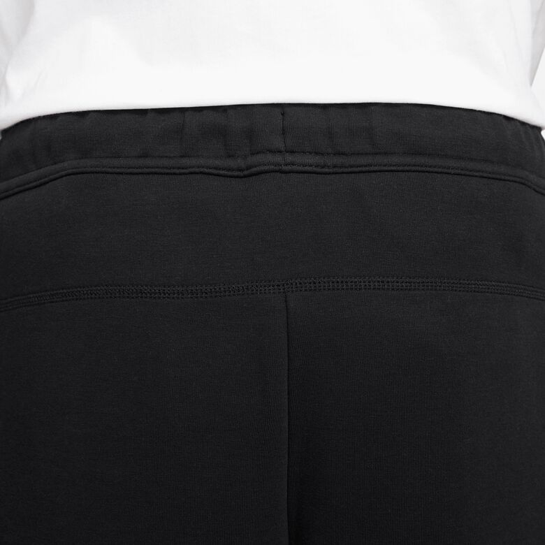 Pantalones deportivos ajustados de tejido técnico polar