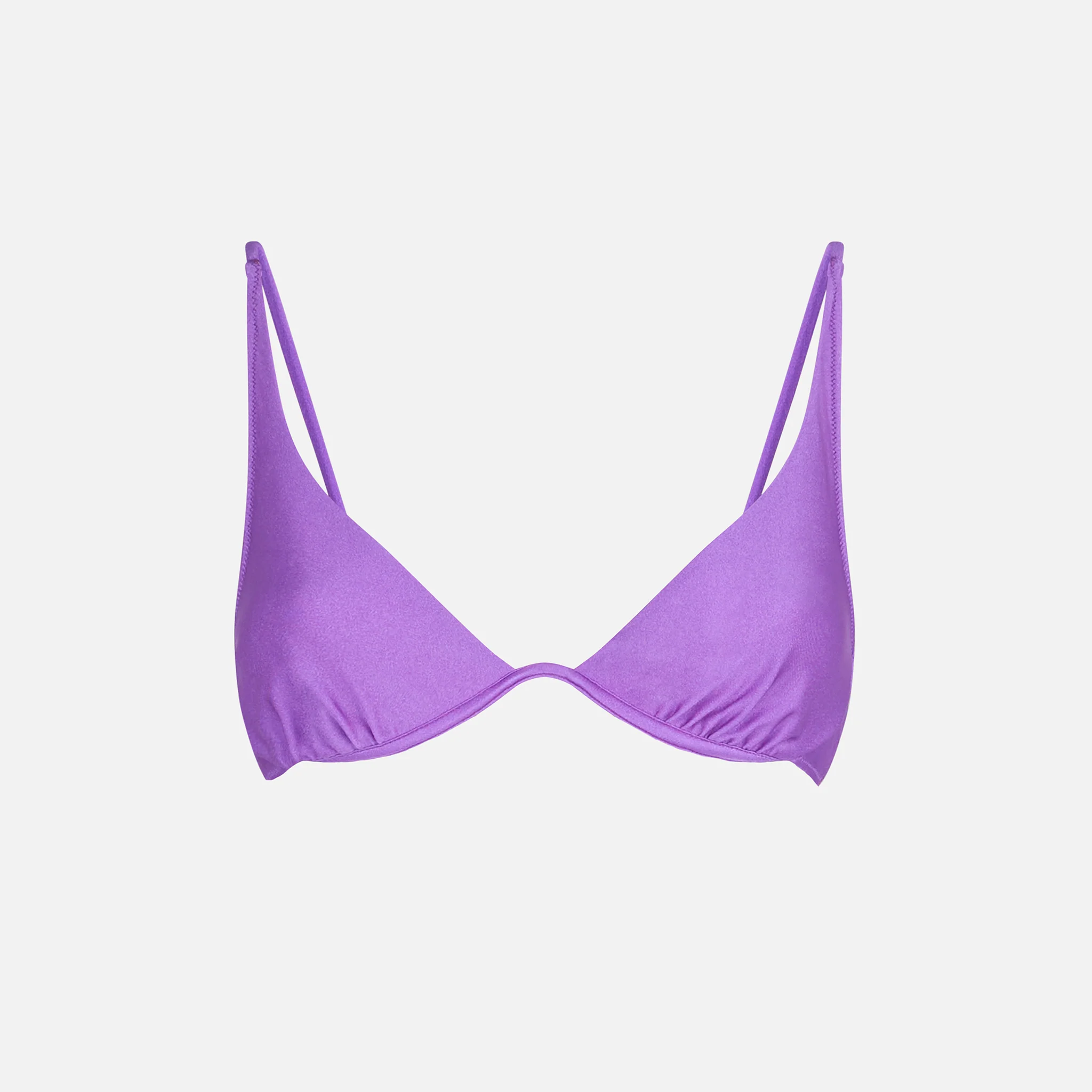 Top de mujer morado brillante con aros