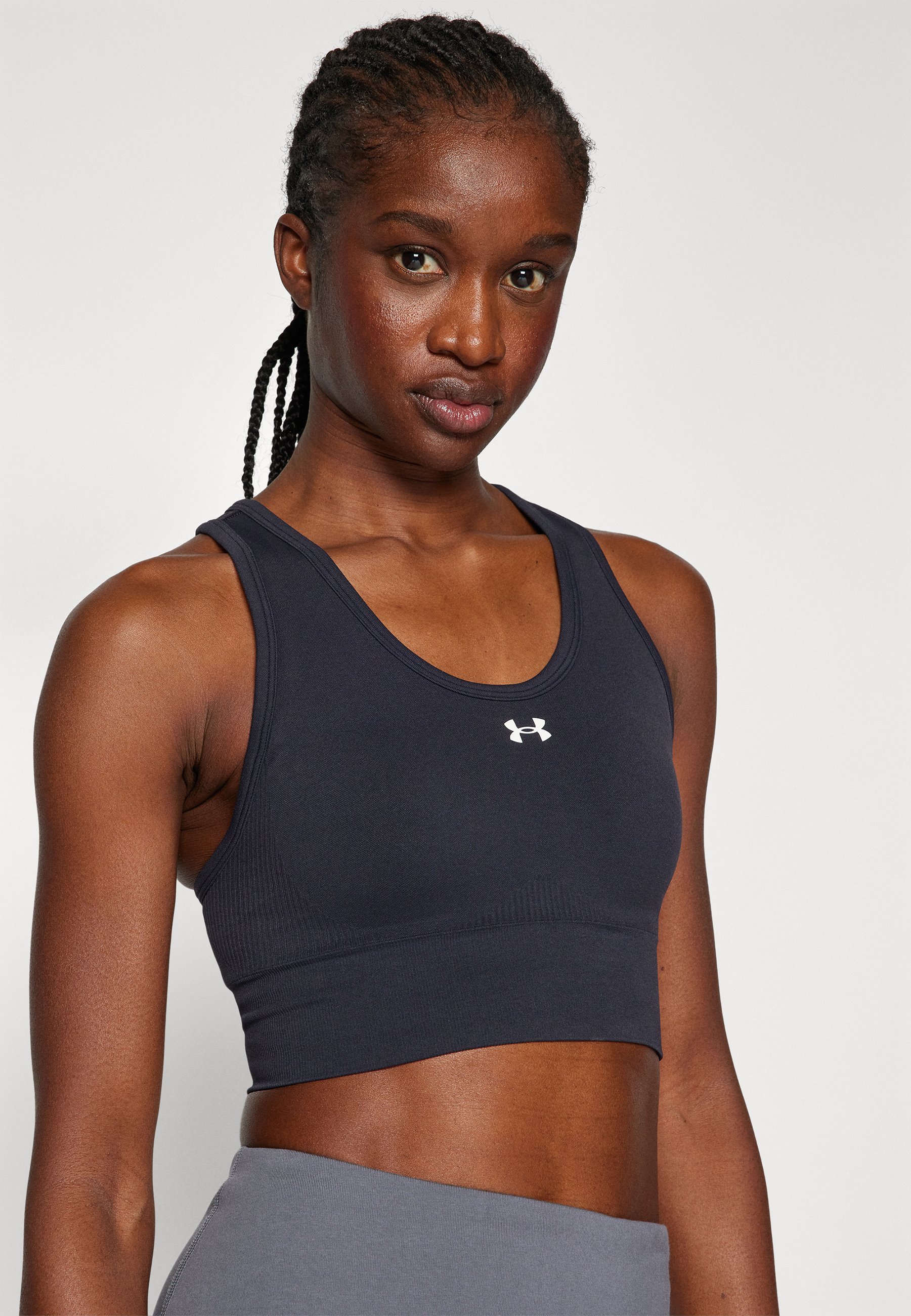 Under Armour VANISH SEAMLESS MID – Biustonosz sportowy o średnim wsparciu – czarno-biały