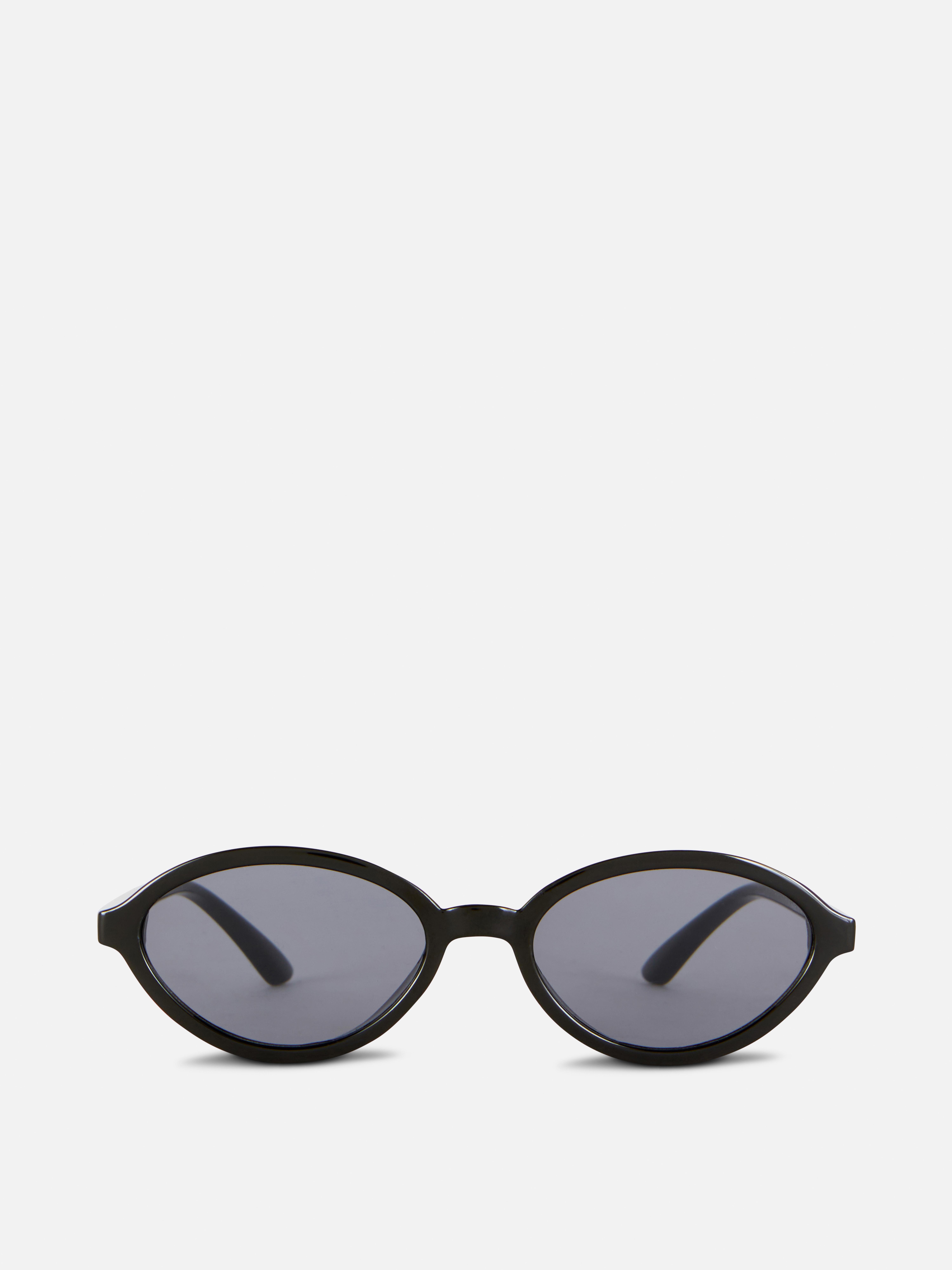 Ochelari de soare ovali, model ajustat. Ochelari de soare ovali cu ramă subțire și lentile colorate, în stilul anilor '90.