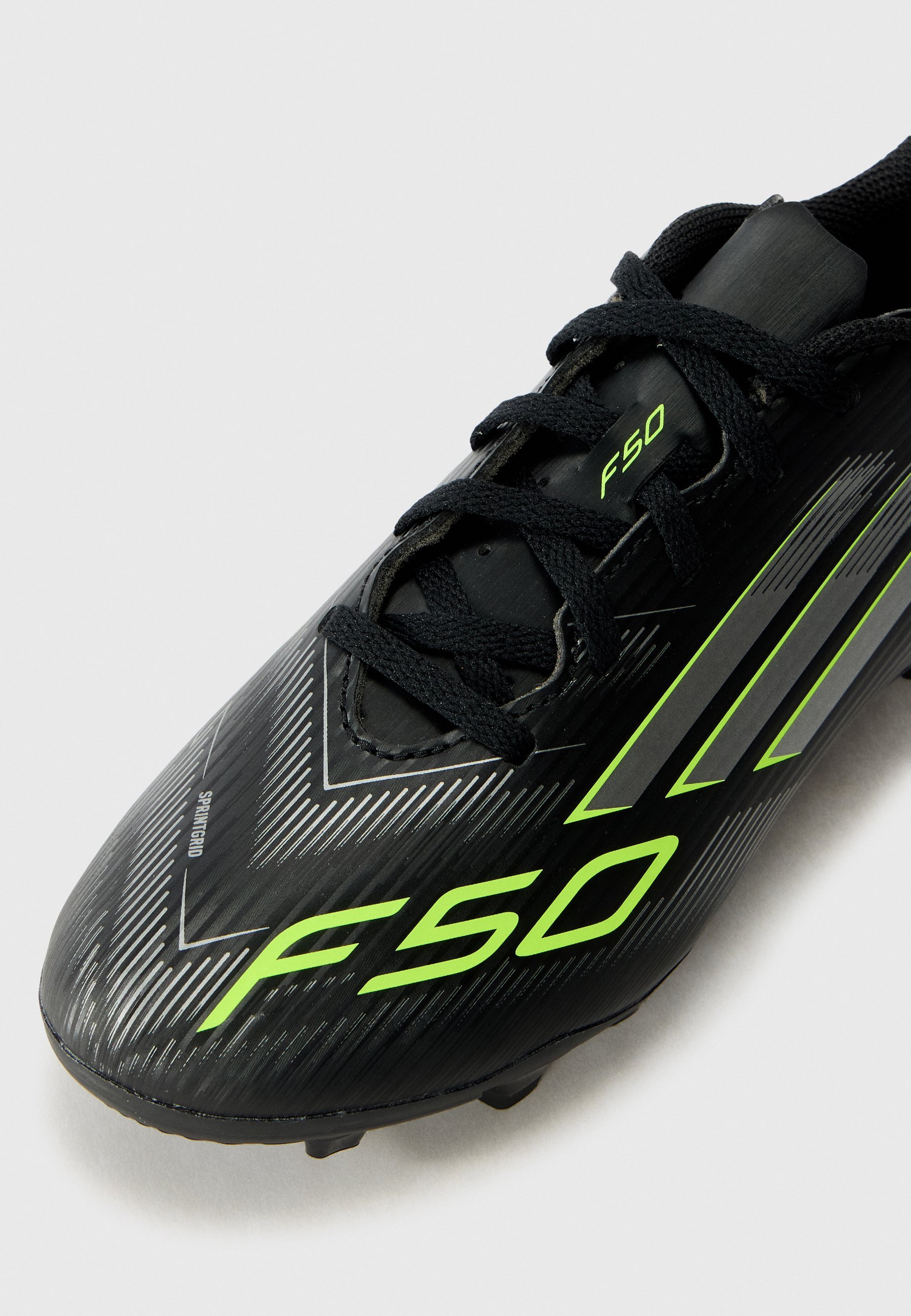 adidas Performance F50 CLUB UNISEX - Nogometni čevlji za trdo podlago - črna/železno obarvana/svetlo limonina