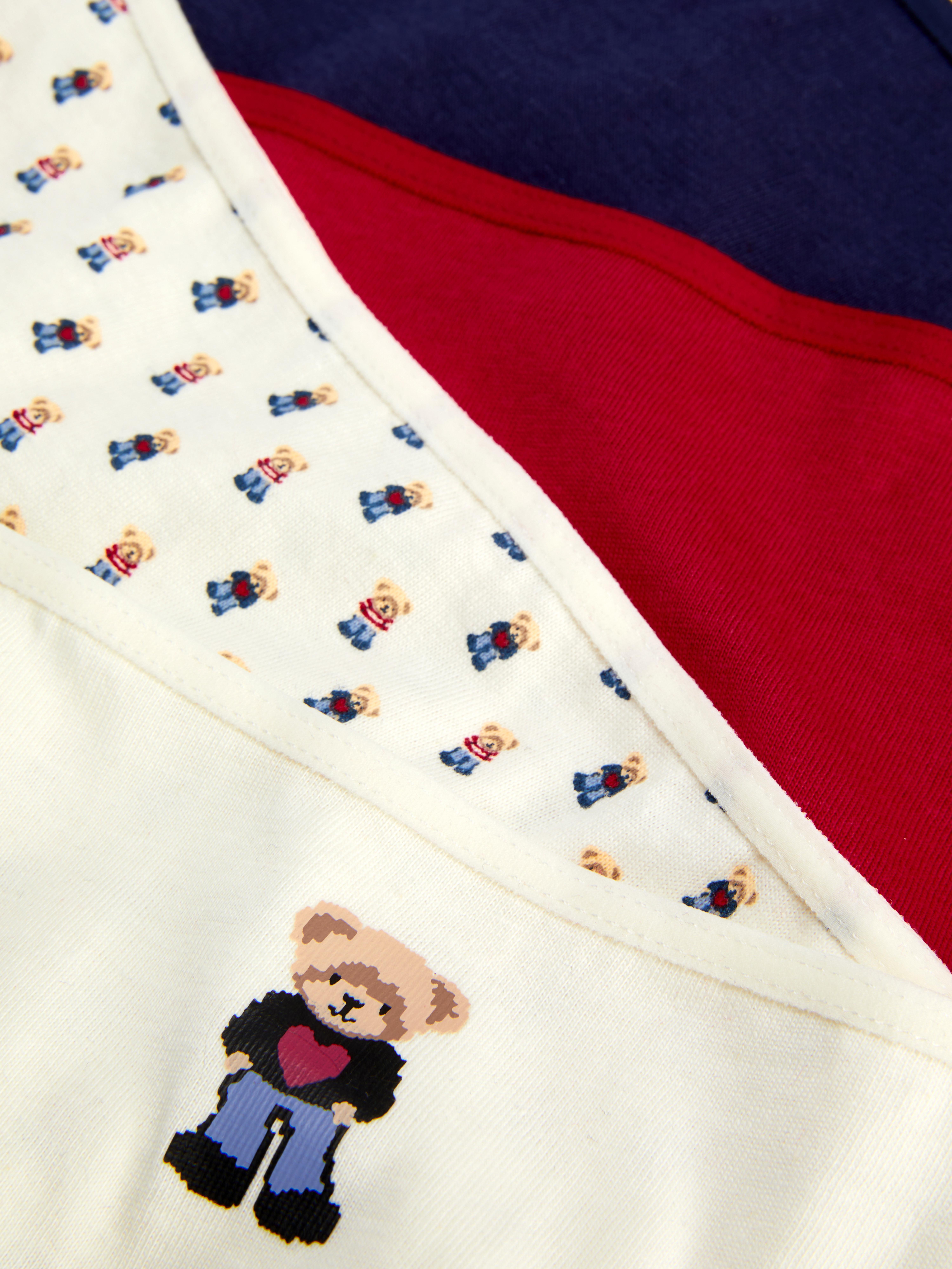 Hochgeschnittene Slips, 4er-Set. Eine Mehrfachpackung hochgeschnittener Slips in verschiedenen Designs.
