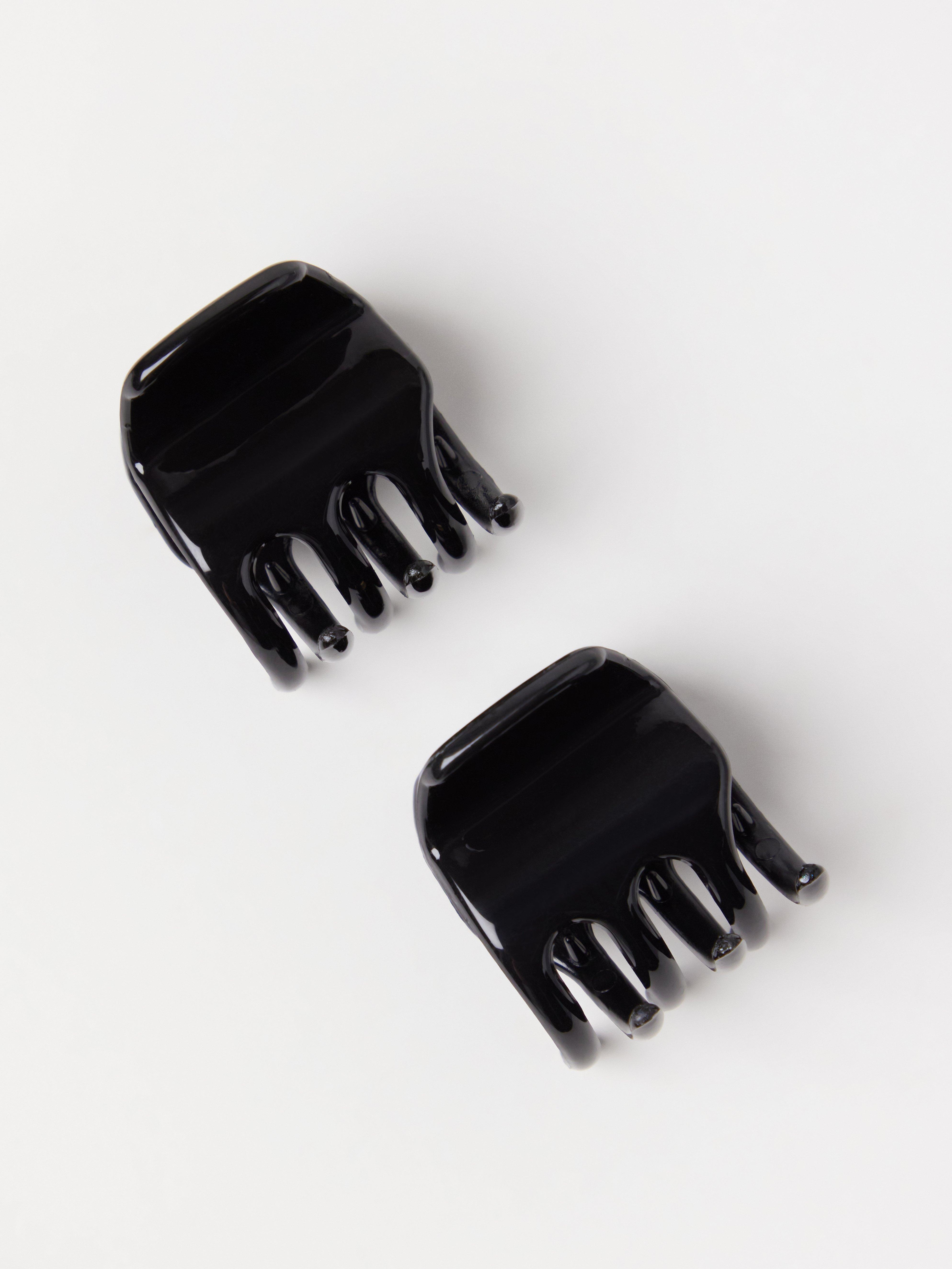 Pacote com 2 unidades de hårklämma Black