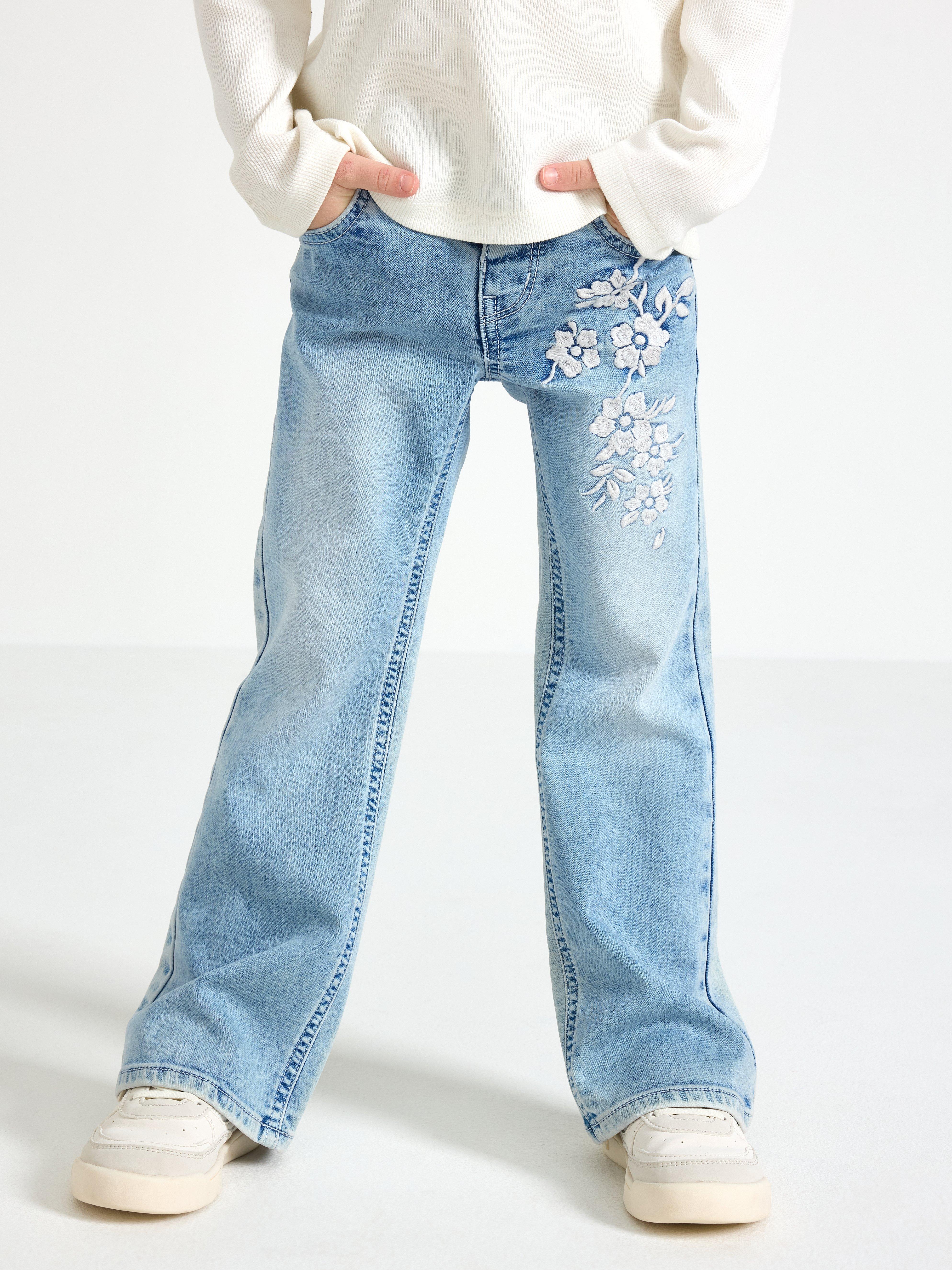 FREJA Jeans acampanados con bordados, mezclilla clara