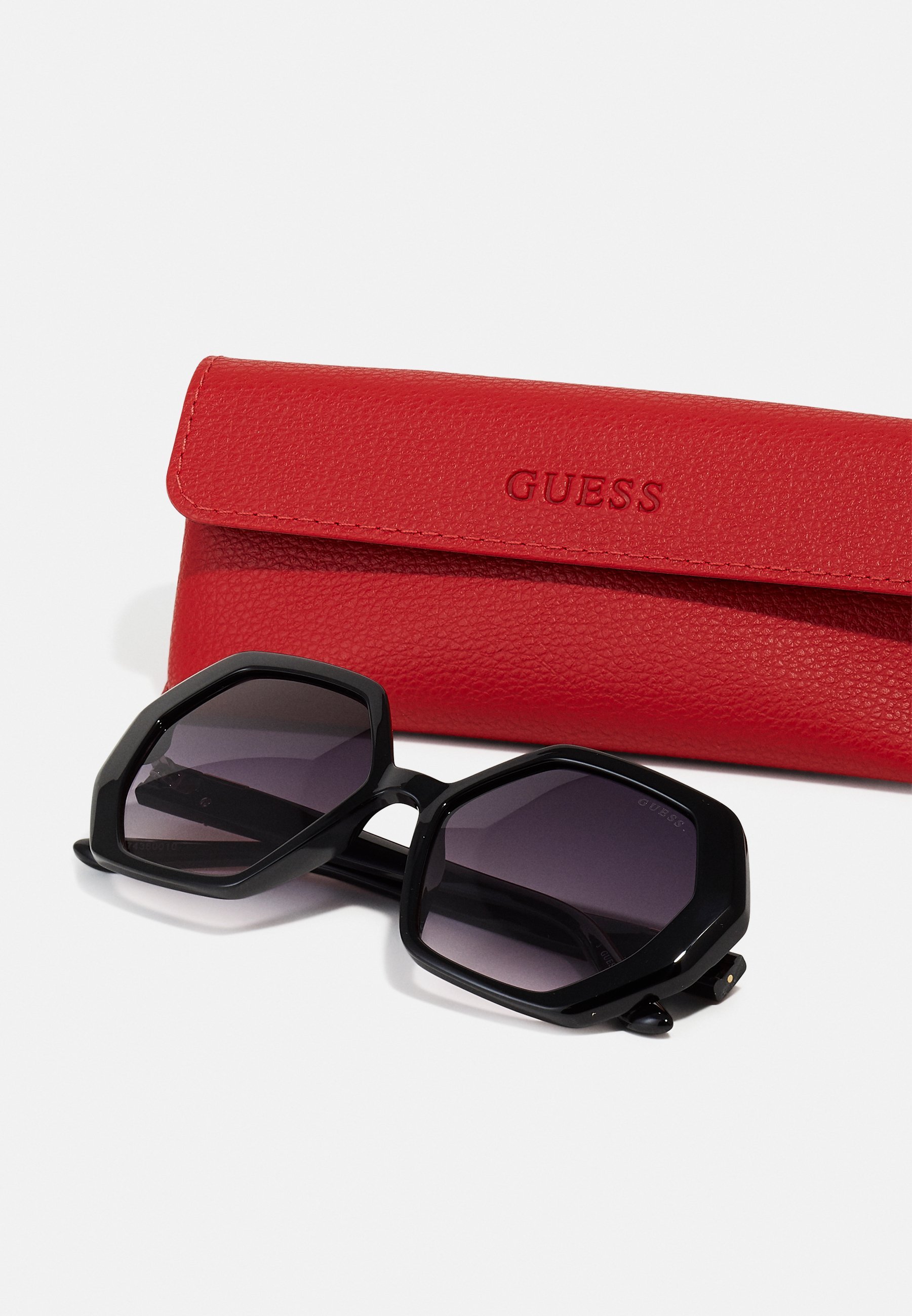 Guess zonnebril - glanzend zwart / verloop rookkleurig