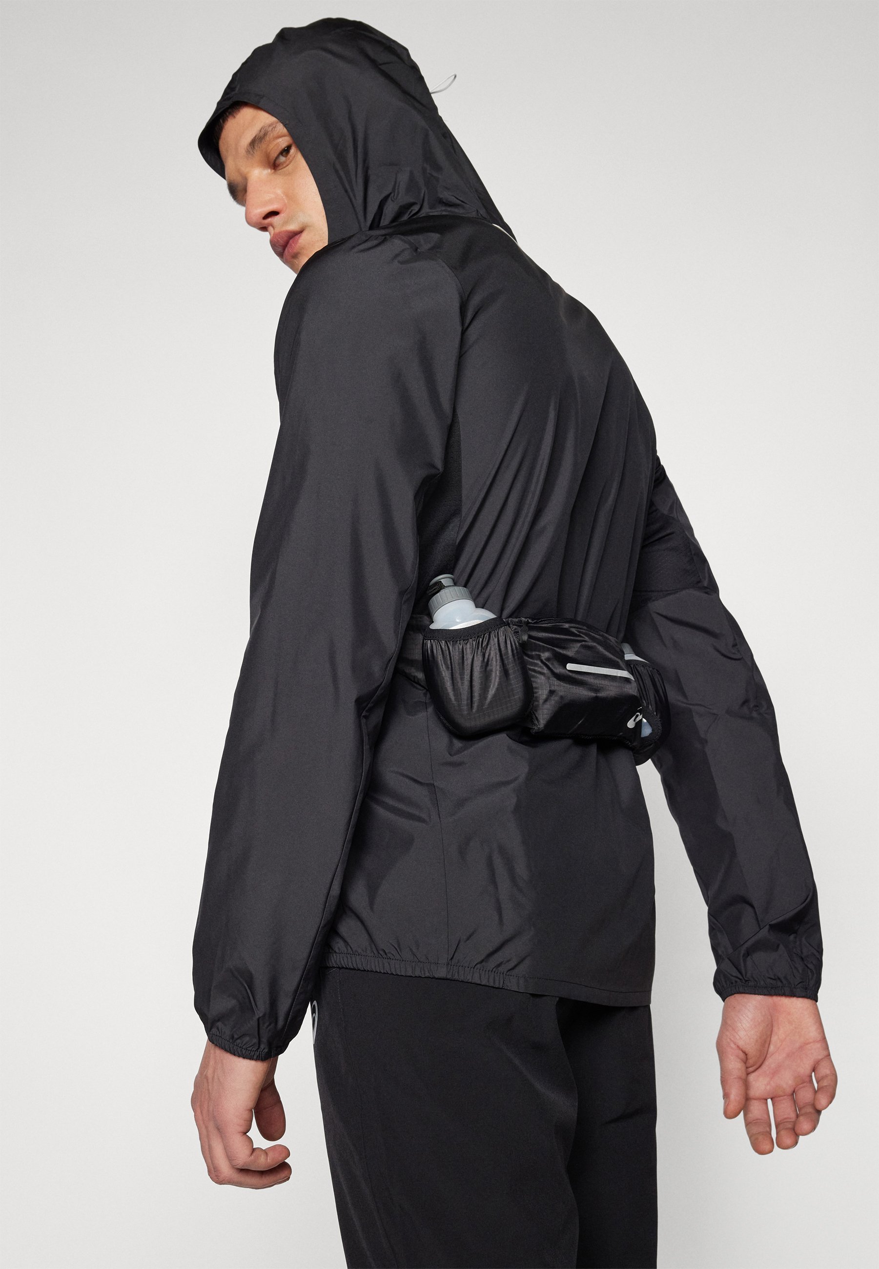 ASICS CORE JACKET - Giacca a vento - nera performante