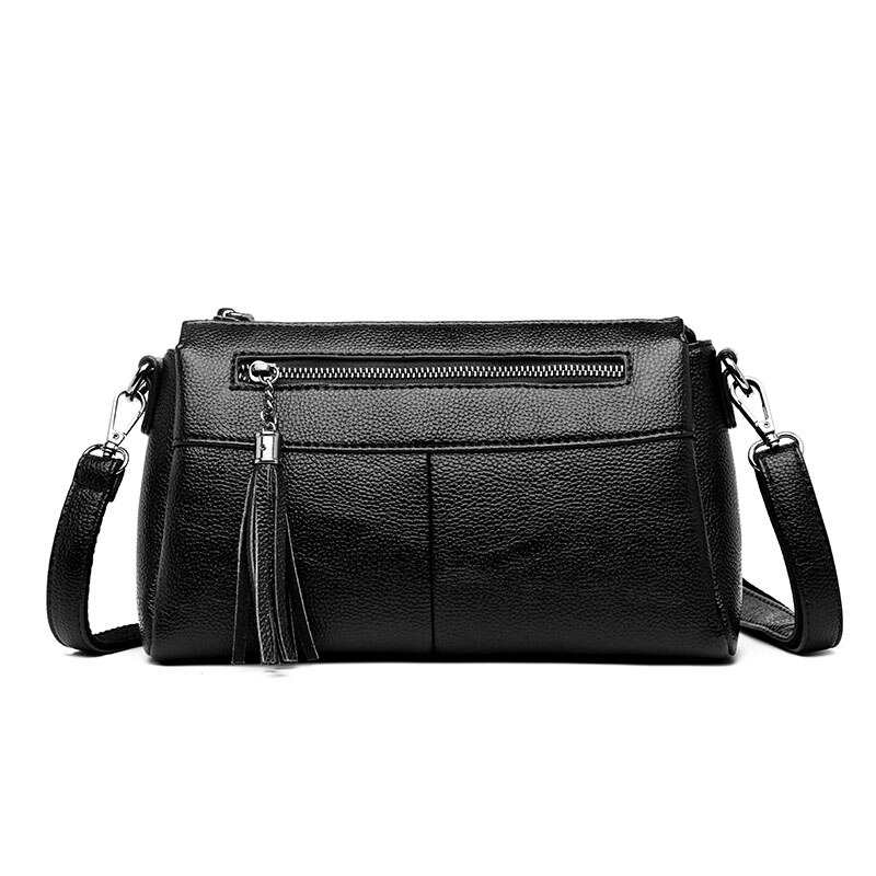 Sac bandoulière femme à pompons en cuir PU uni avec motif lettres et broderie, sac messager à rabat, design simple et tendance.