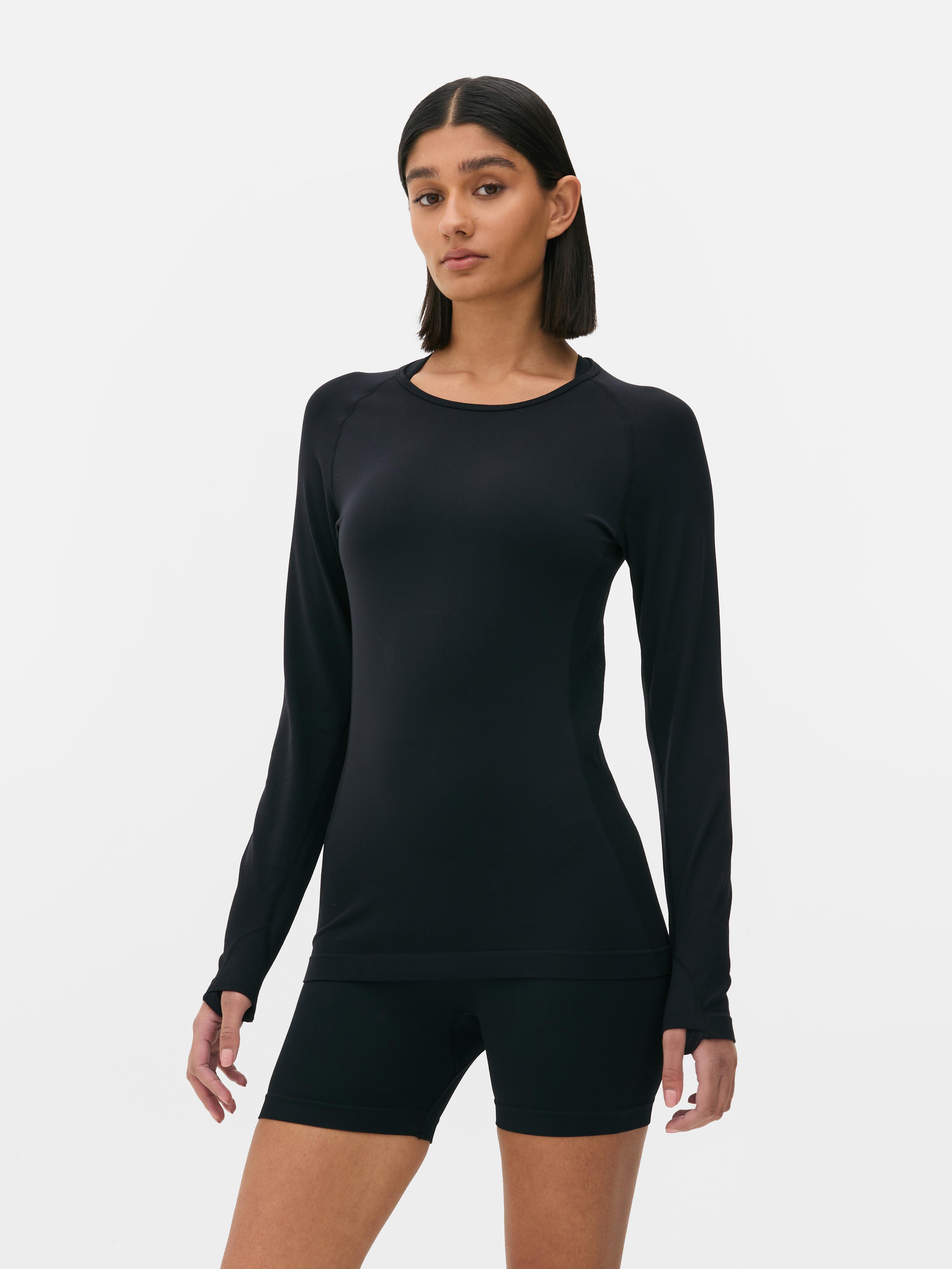 Tricou sport cu mânecă lungă și fără cusături Antrenează-te mai bine ca niciodată cu acest tricou cu guler rotund