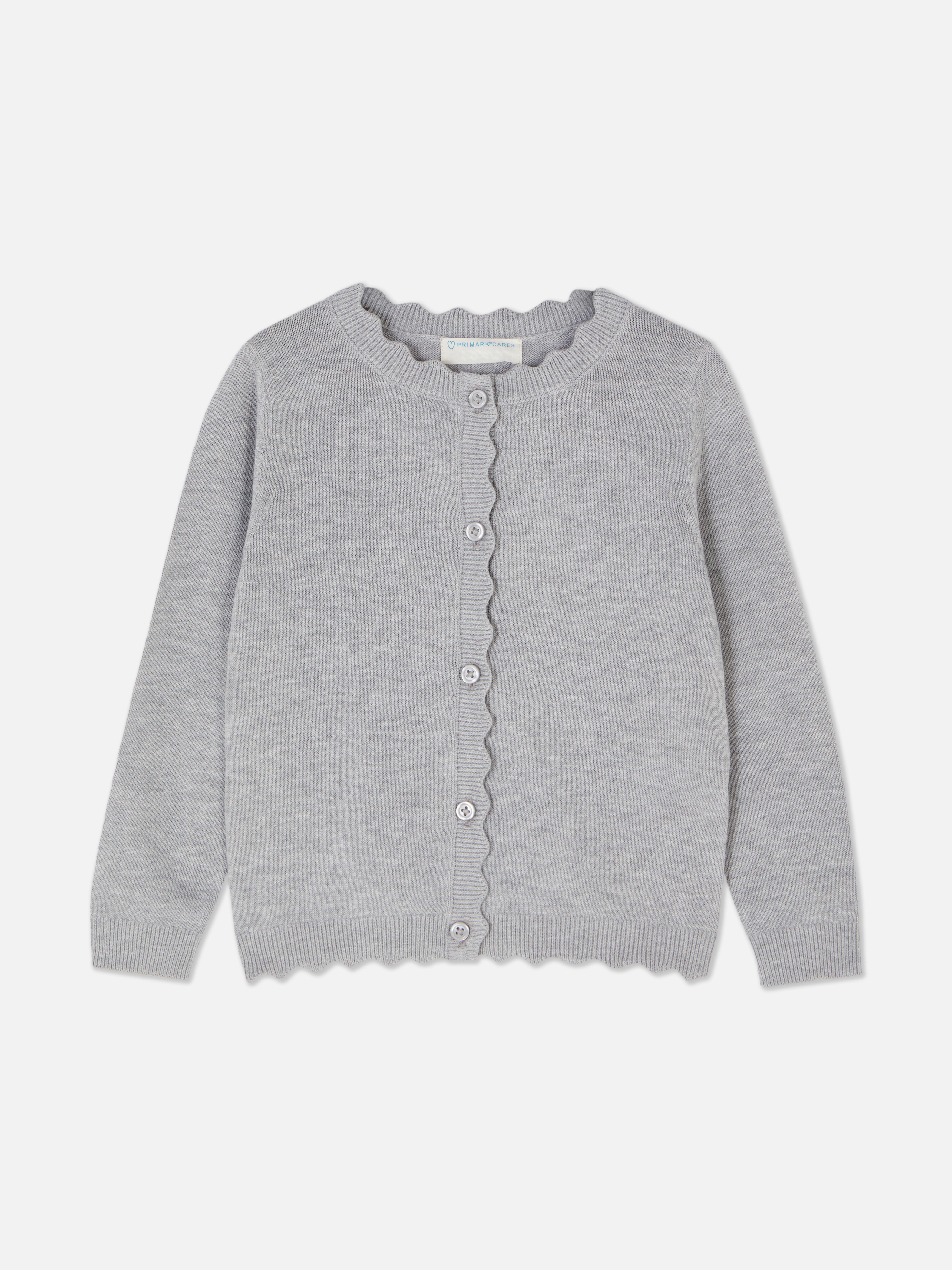 Cardigan with button closure and scalloped edge A cute cardigan with long sleeves, button closure, and scalloped edges