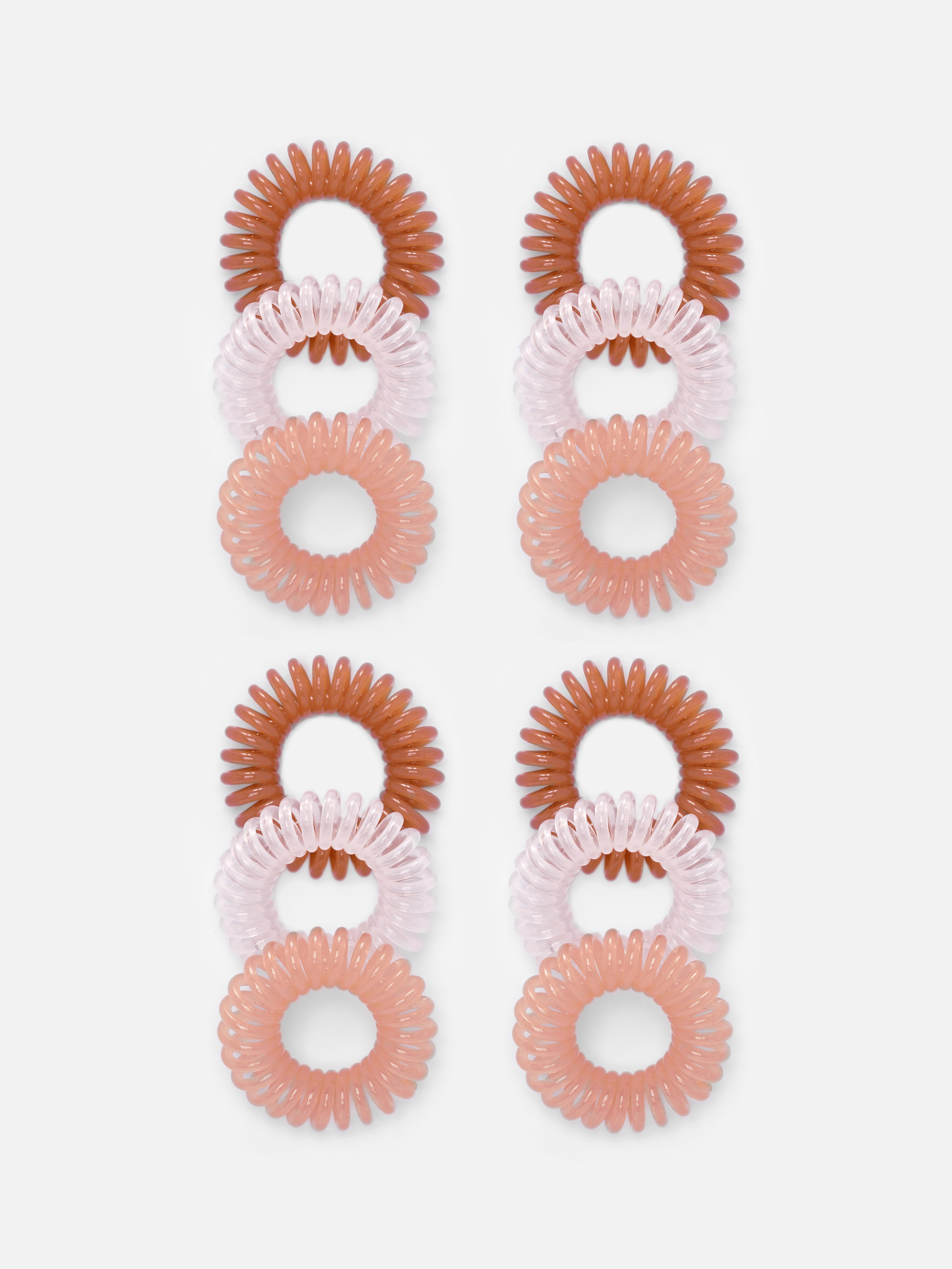 Spiralhaargummis, 12er-Set. Binden Sie Ihr Haar mit unseren Spiralhaargummis nahtlos zu einem Pferdeschwanz.
