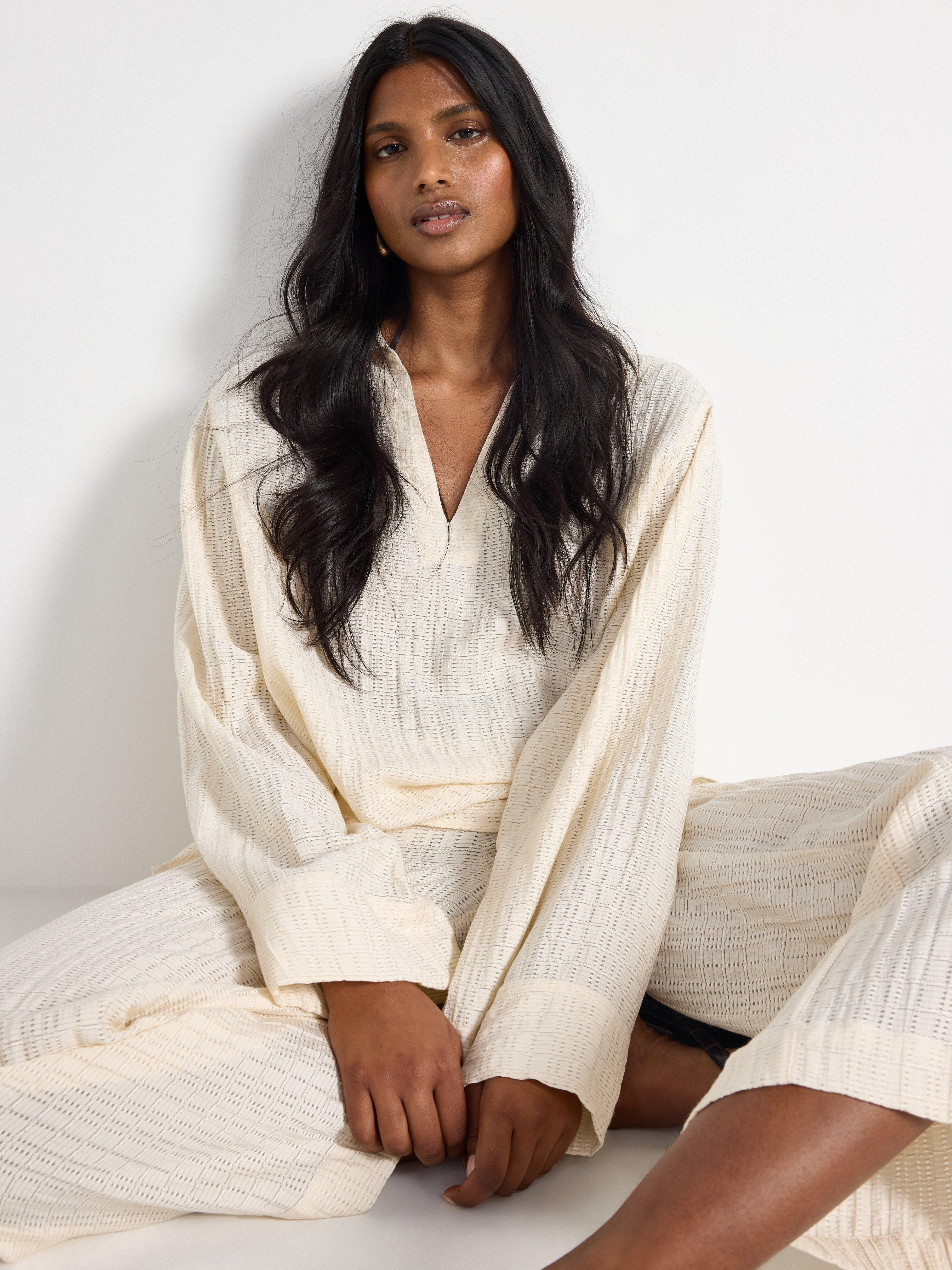 LYKKE Los pantalones anchos Blanco roto