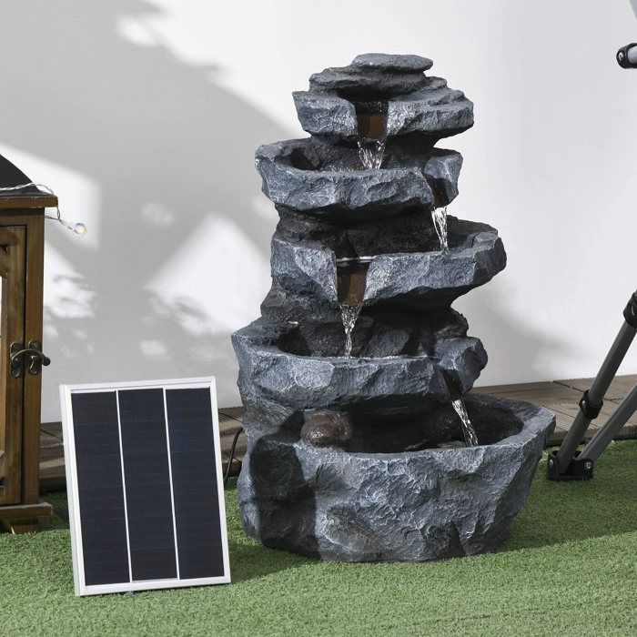 Fuente de jardín Outsunny de 5 niveles con cascada de roca, alimentada por energía solar, fabricada en resina con luces LED y bomba, color gris.