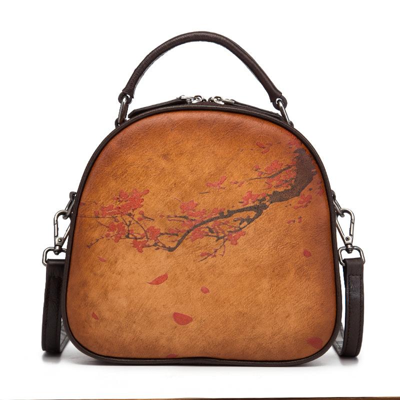 Borsa a mano circolare in vera pelle bovina con motivo a fiori di prugno, in pelle autentica di alta qualità, da donna, a tracolla, con manico superiore.