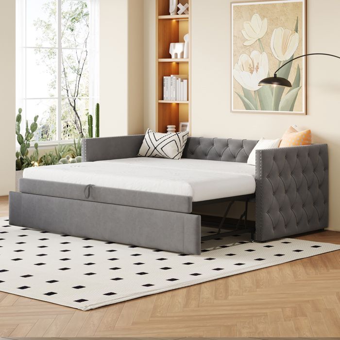 Lit banquette convertible en velours gris avec capitonnage, sommier à lattes