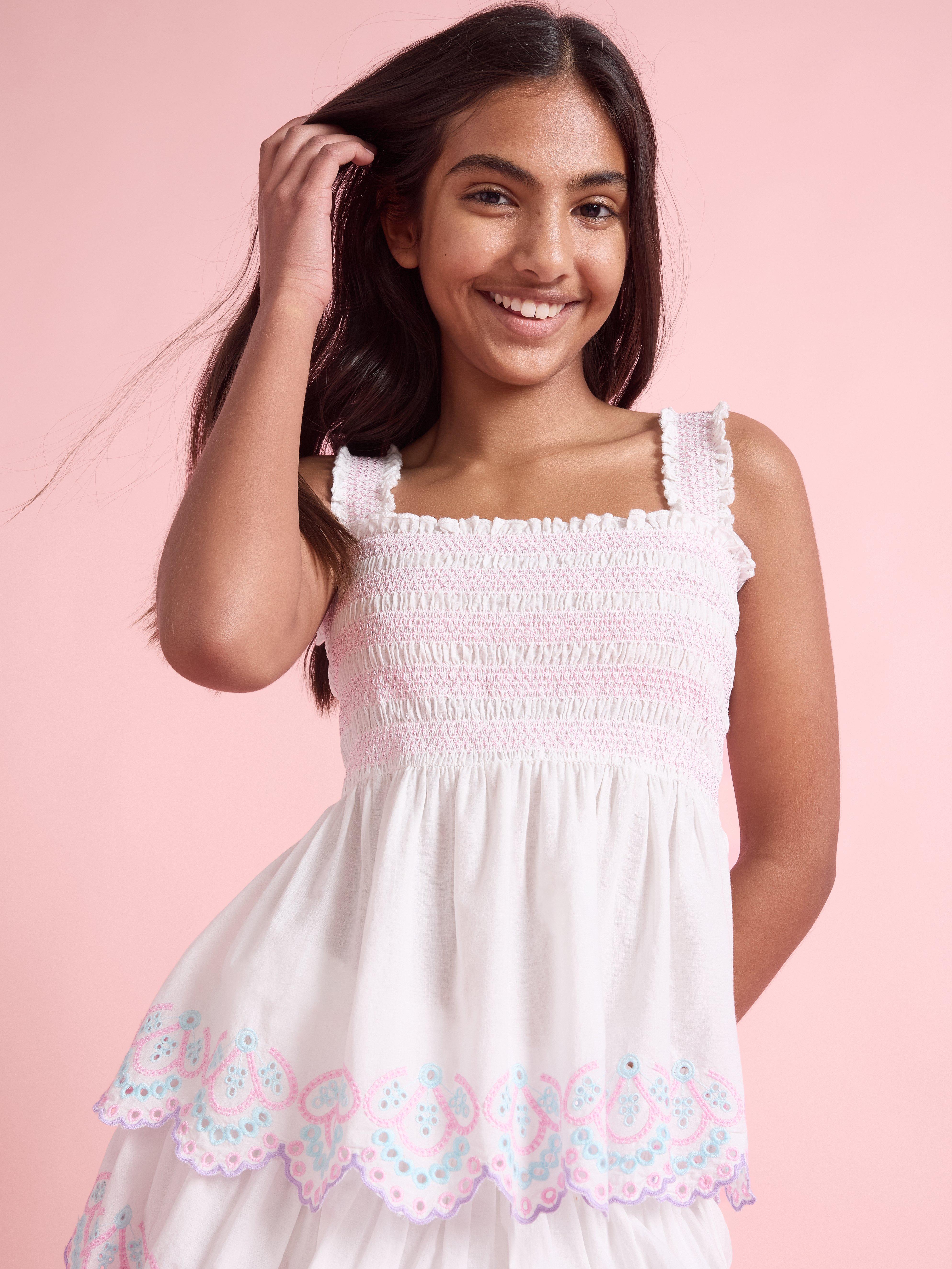 Peplum top med broderi Off White