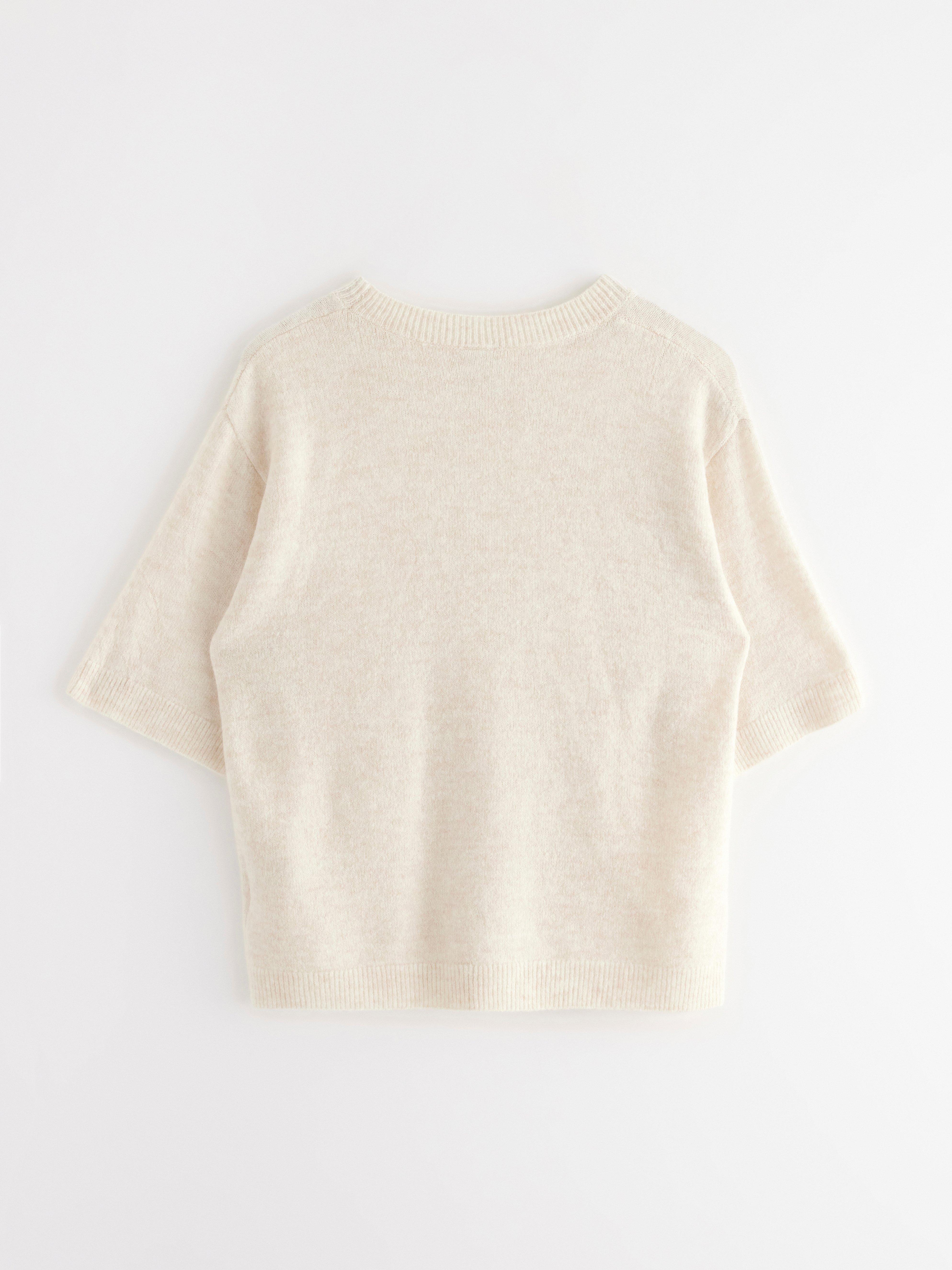Jersey de punto de manga corta color beige claro jaspeado
