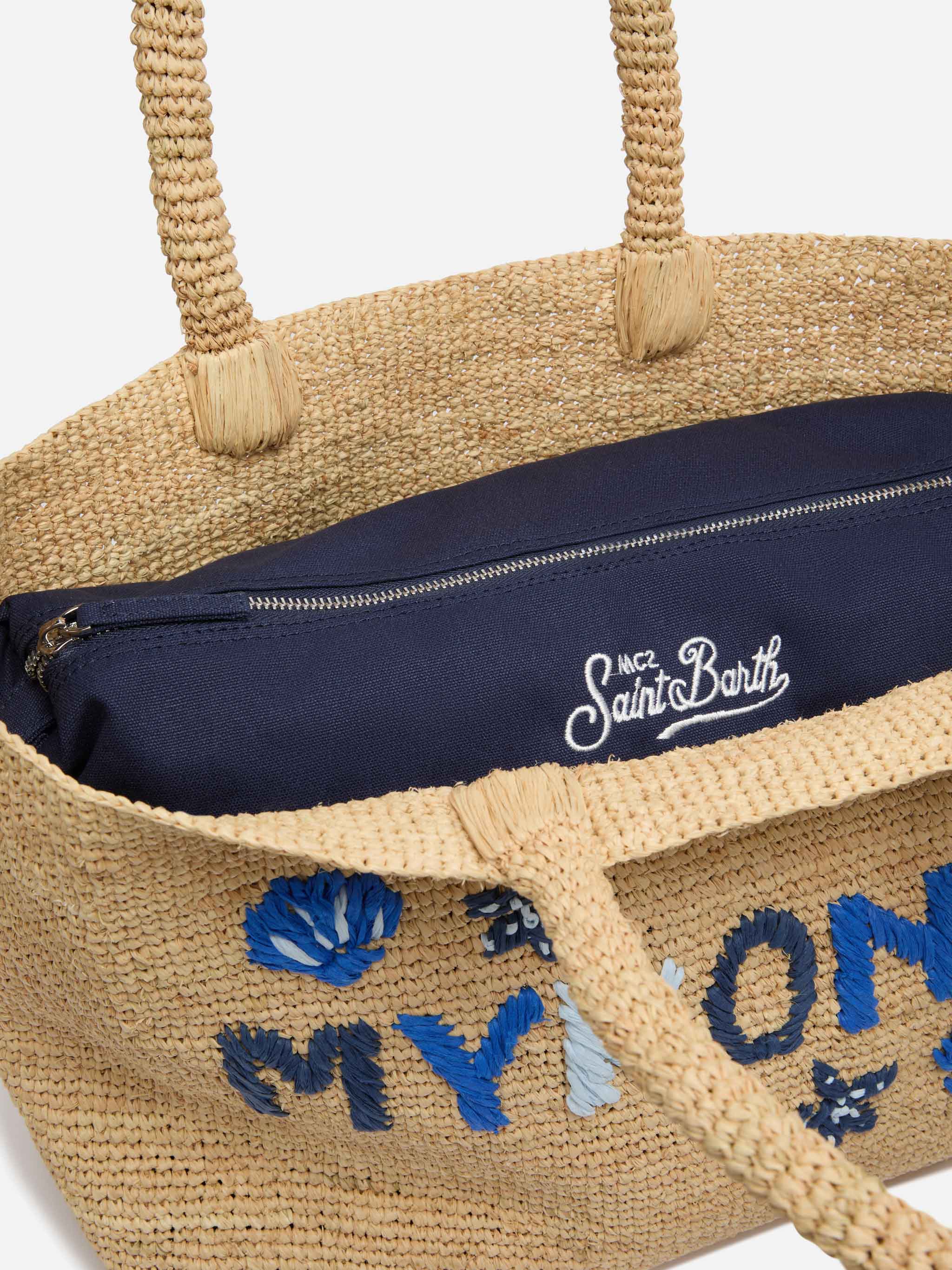 Beige raffia strandtas met katoenen binnenvak en Mykonos-borduurwerk.