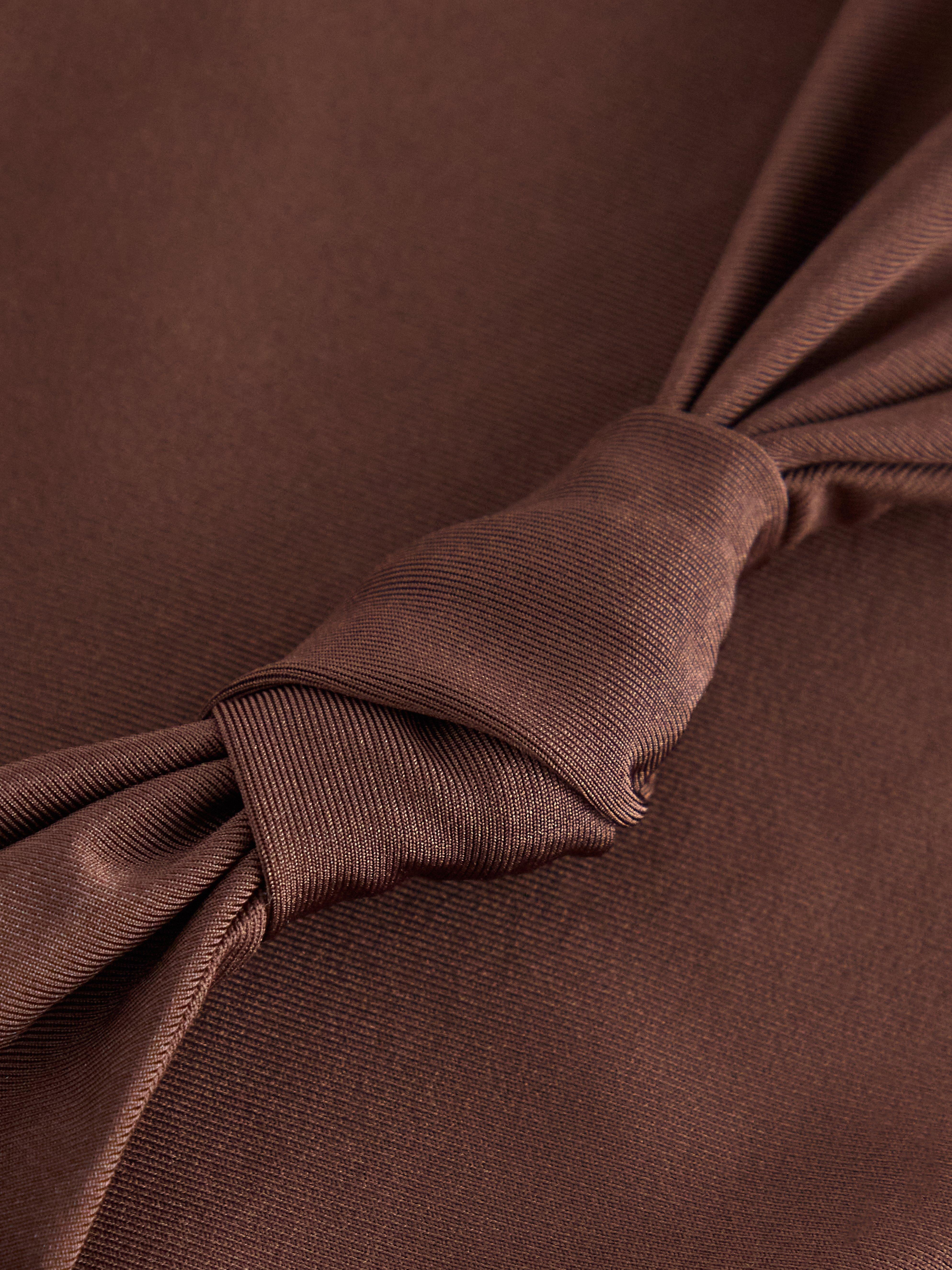 Bikini brasileño de DK Brown