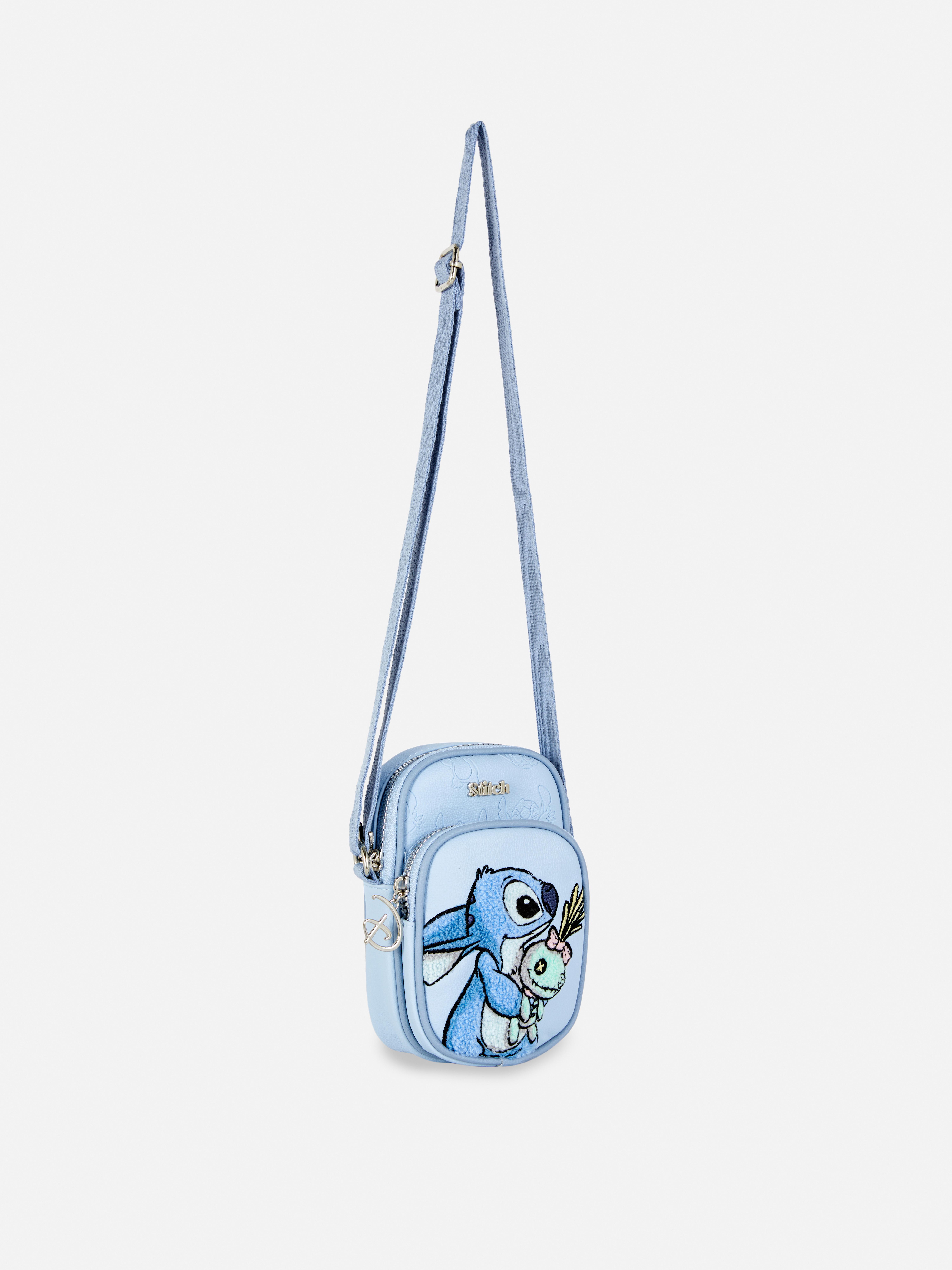 Geantă de umăr din piele ecologică Disney Stitch. O geantă de umăr albastră Stitch cu curea reglabilă și două compartimente.