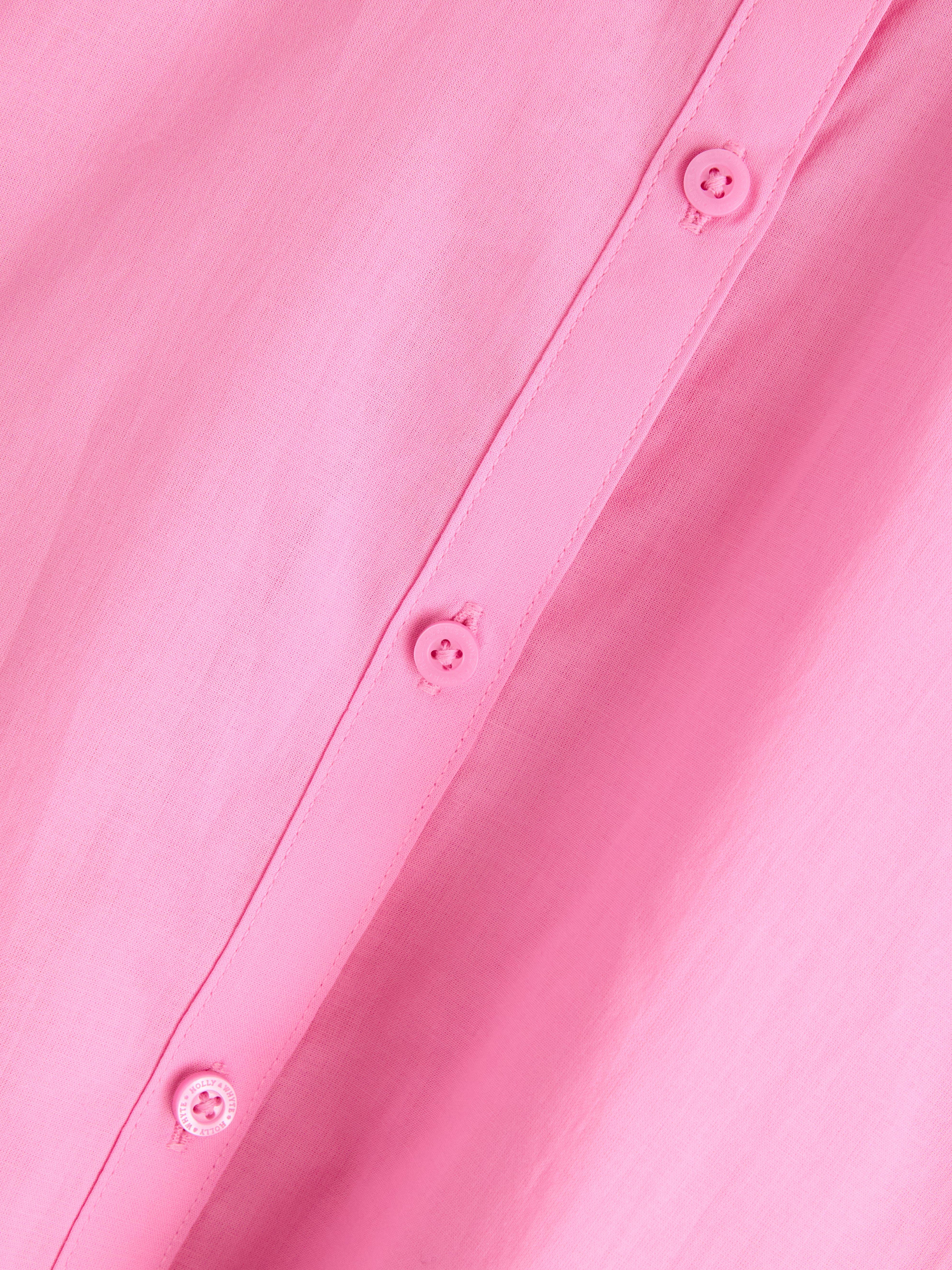 Vestido camisero corto rosa claro