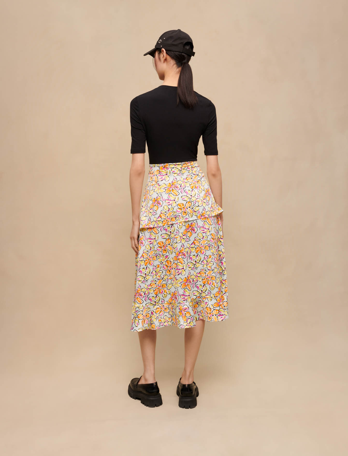 Rok met bloemenprint en knoopdetail - Hibiscus oranje/blauw