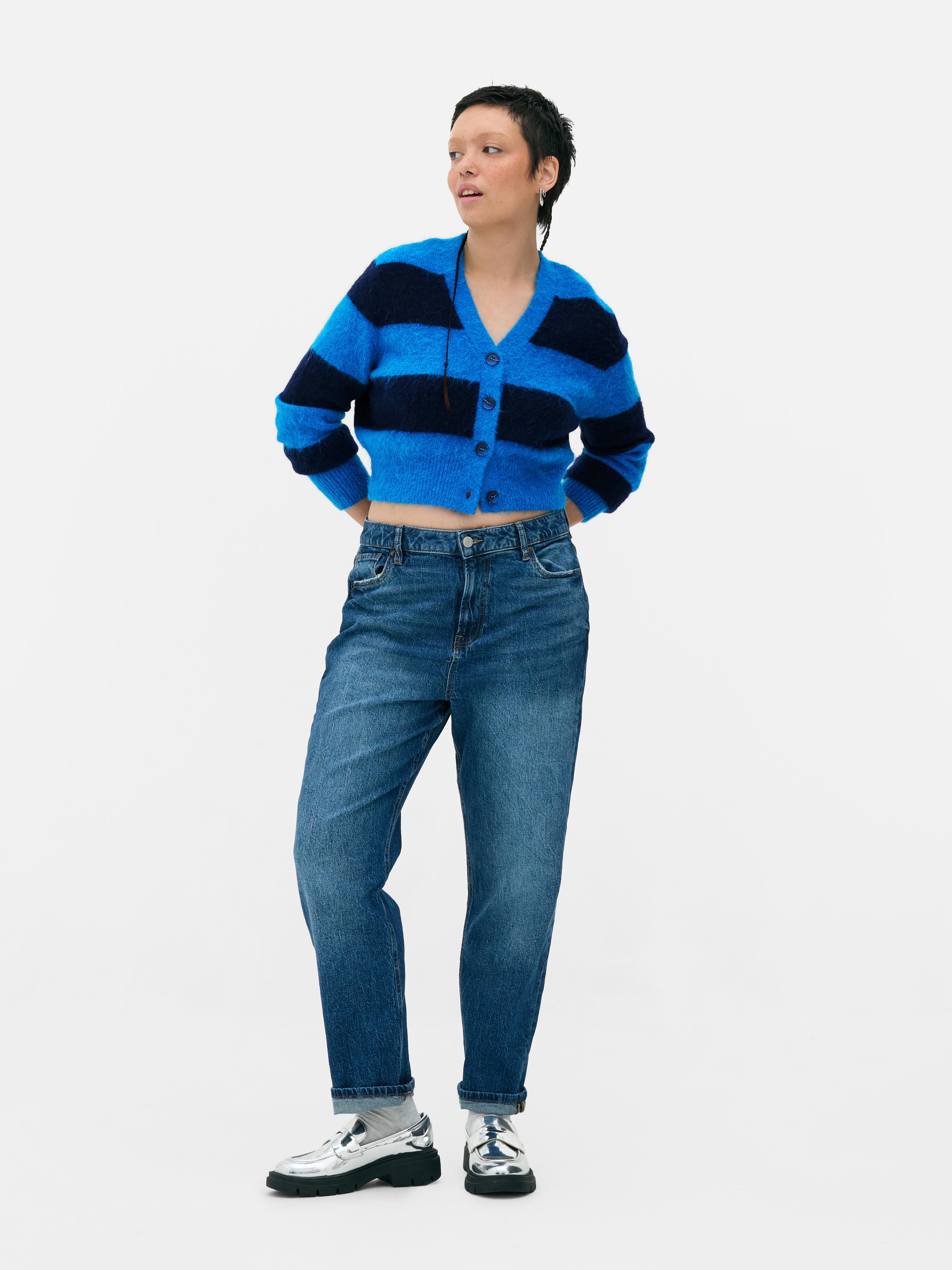 Cardigan corto a righe Questo cardigan a righe ha uno scollo a V e uno stile corto