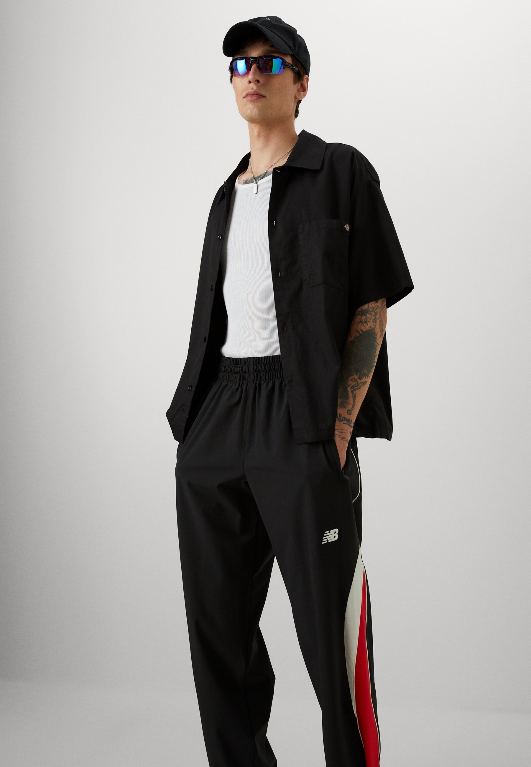 New Balance IN GAME TRACK PANT - Melegítőalsó - fekete