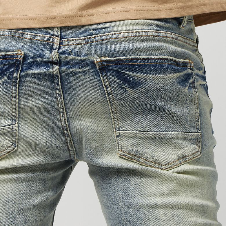 Vintage tvättade, slitna och lagade jeans