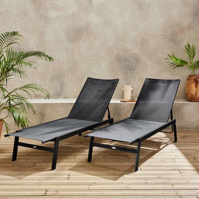 Set di 2 lettini prendisole neri. 5 posizioni. Realizzati in textilene e metallo. FLORA. L155 x P59 x H106 cm