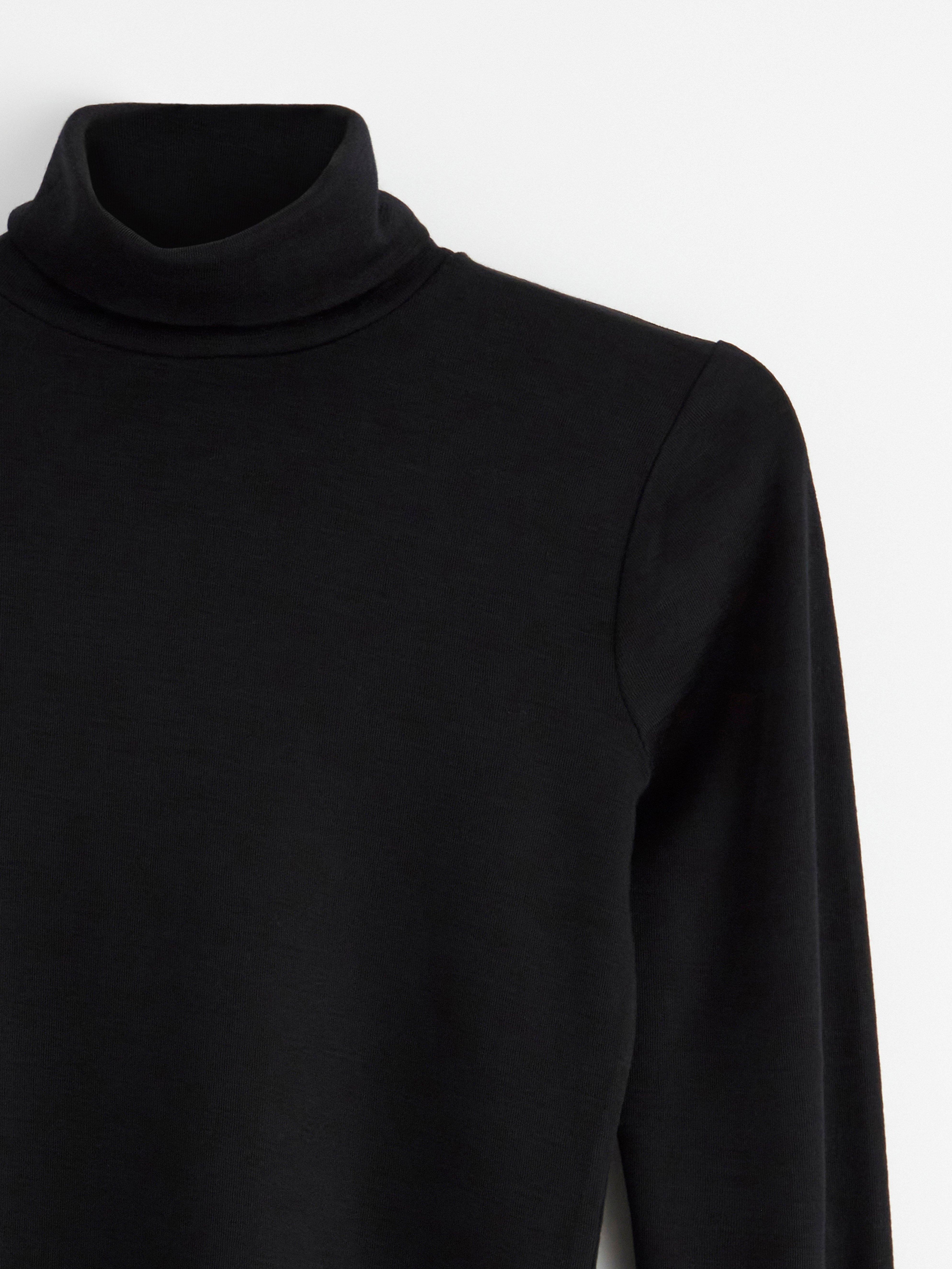 Polo en laine mérinos noir