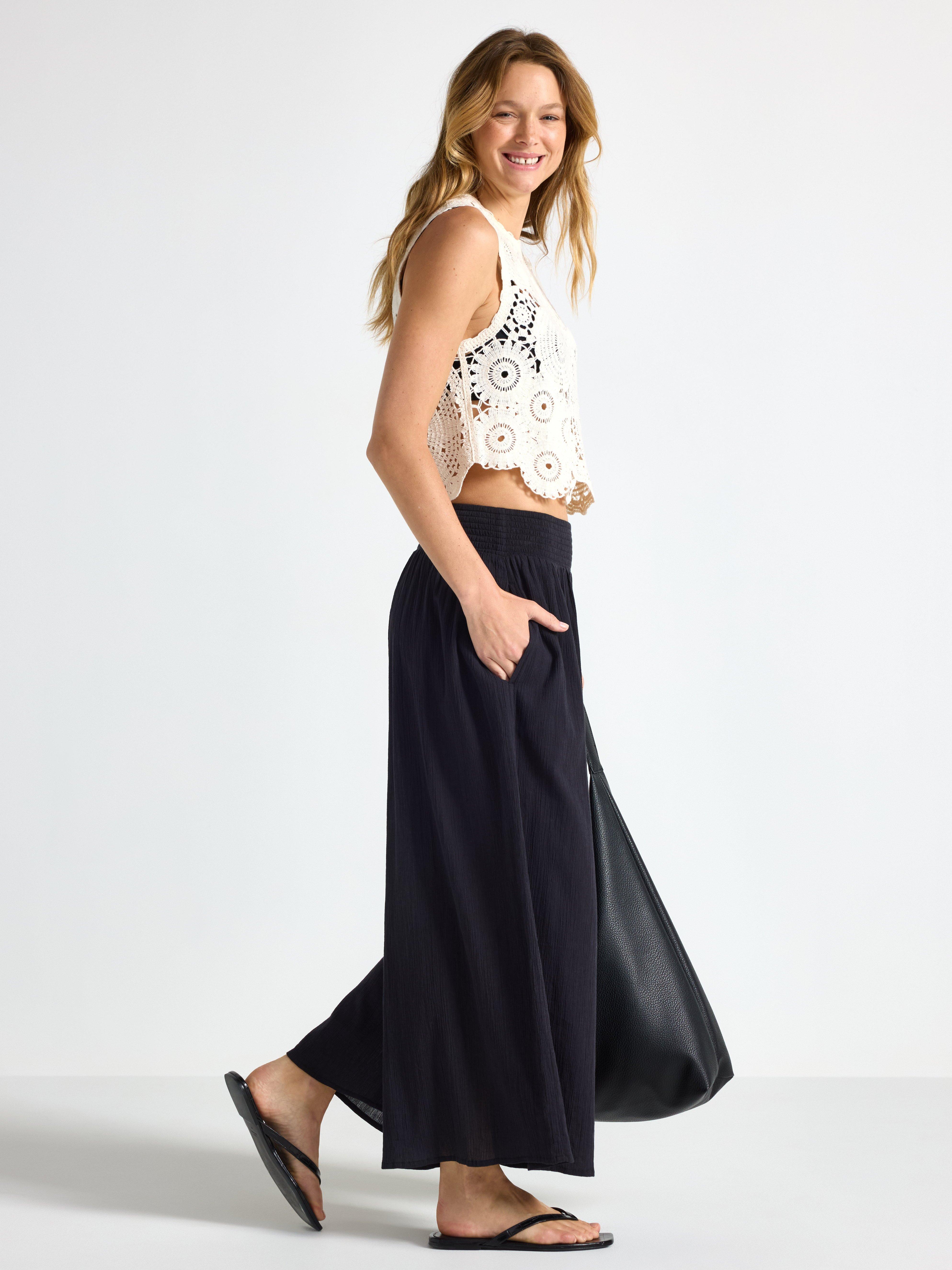 Pantalones anchos tobilleros negros