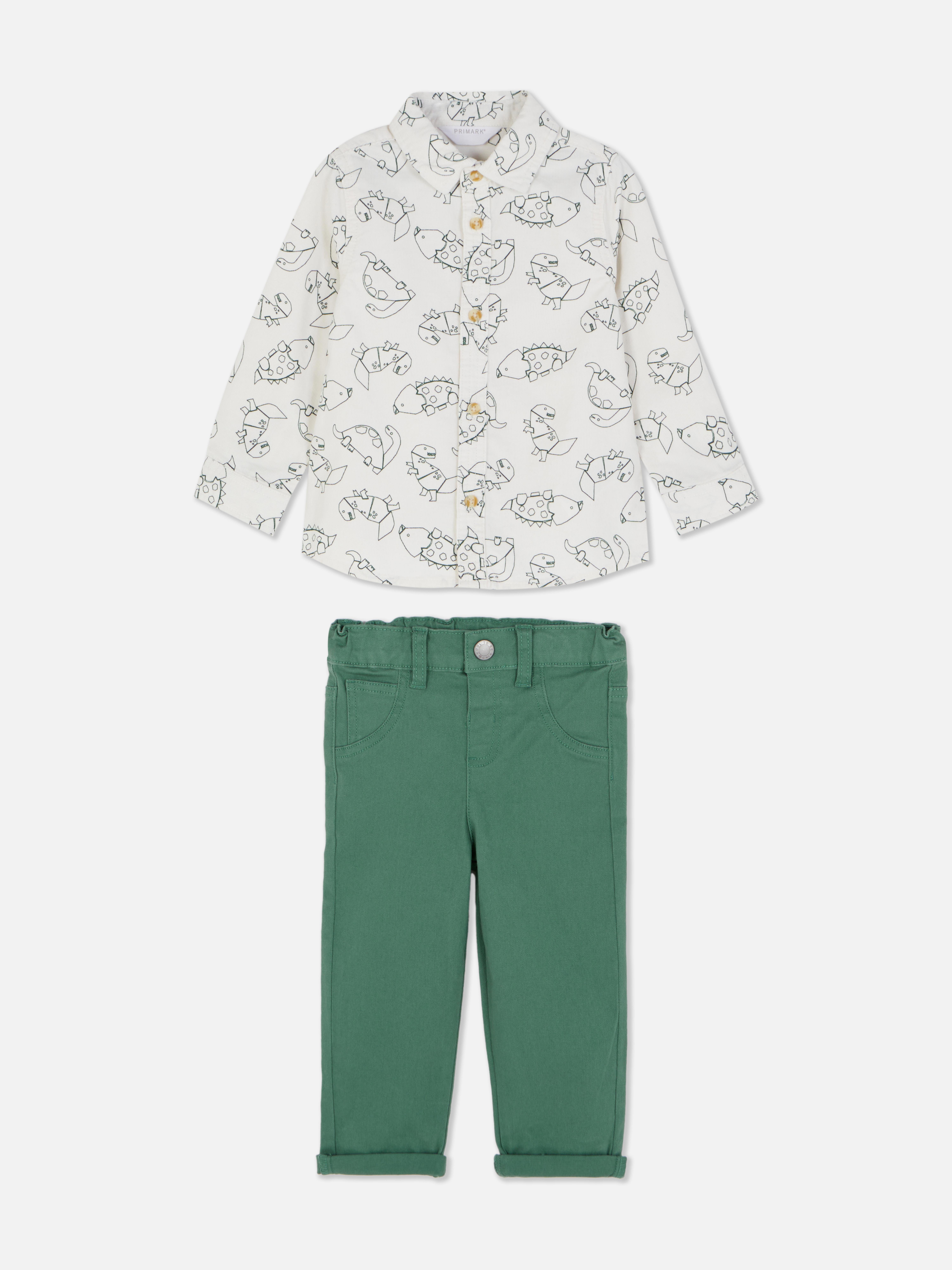 Set cămașă și pantaloni cu dinozaur. O cămașă și pantaloni cu mânecă lungă și manșete cu nervuri.