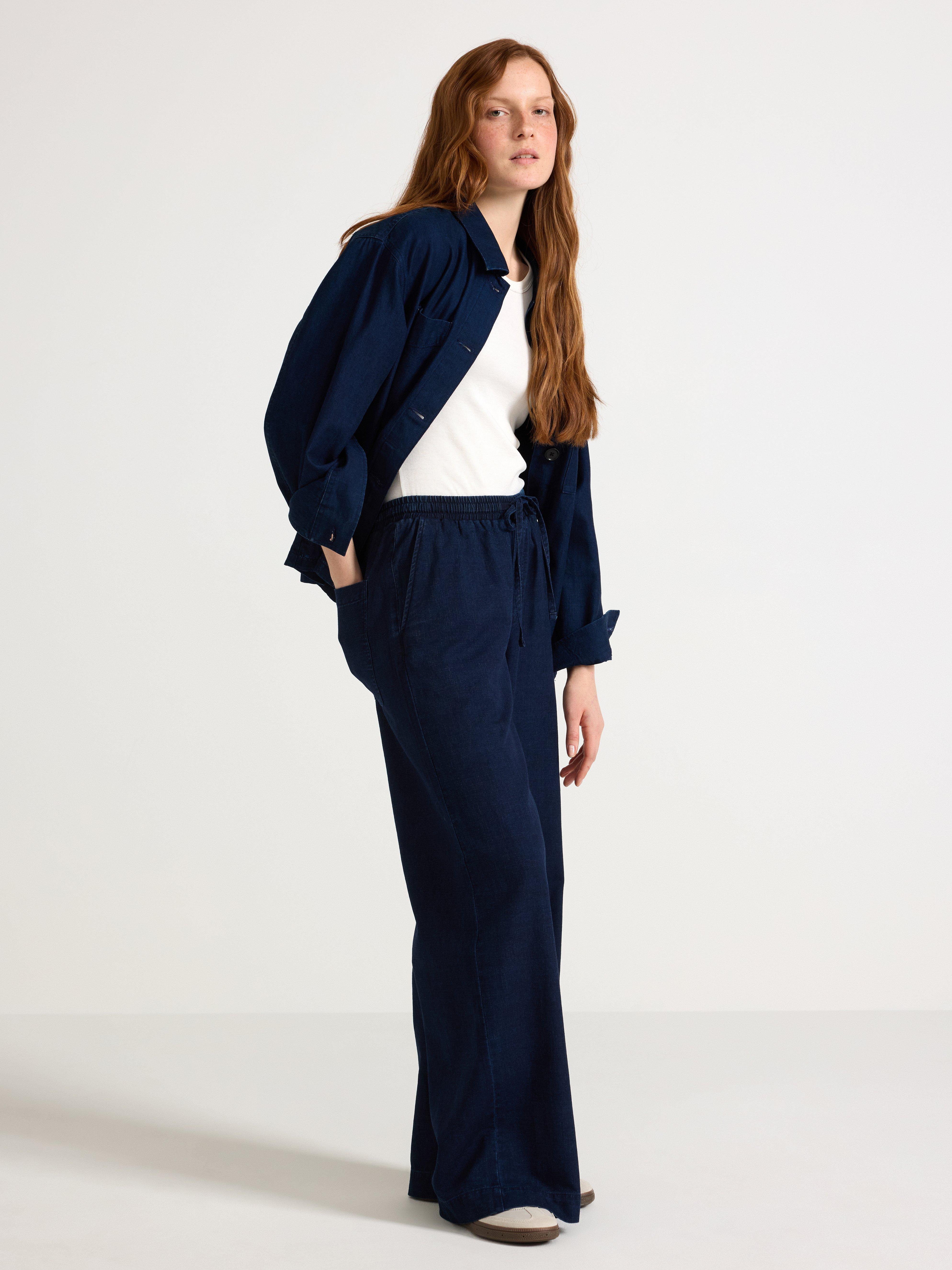 Pantalones vaqueros con cordón ajustable, color azul vaquero.