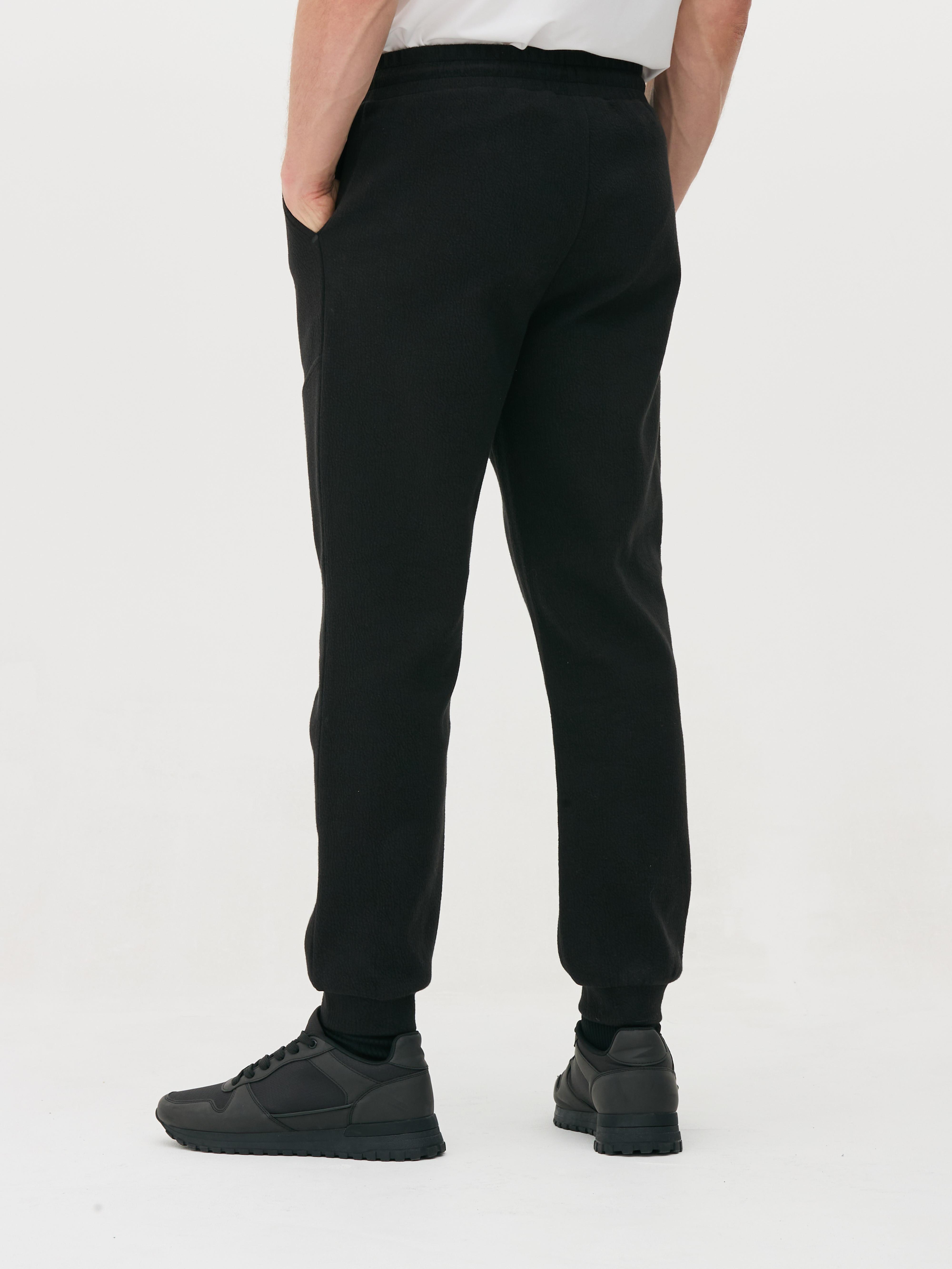 Pantaloni de trening texturați cu șnur de strângere Pantaloni de trening cu șnur de strângere, buzunare laterale, clinuri și manșete la gleznă