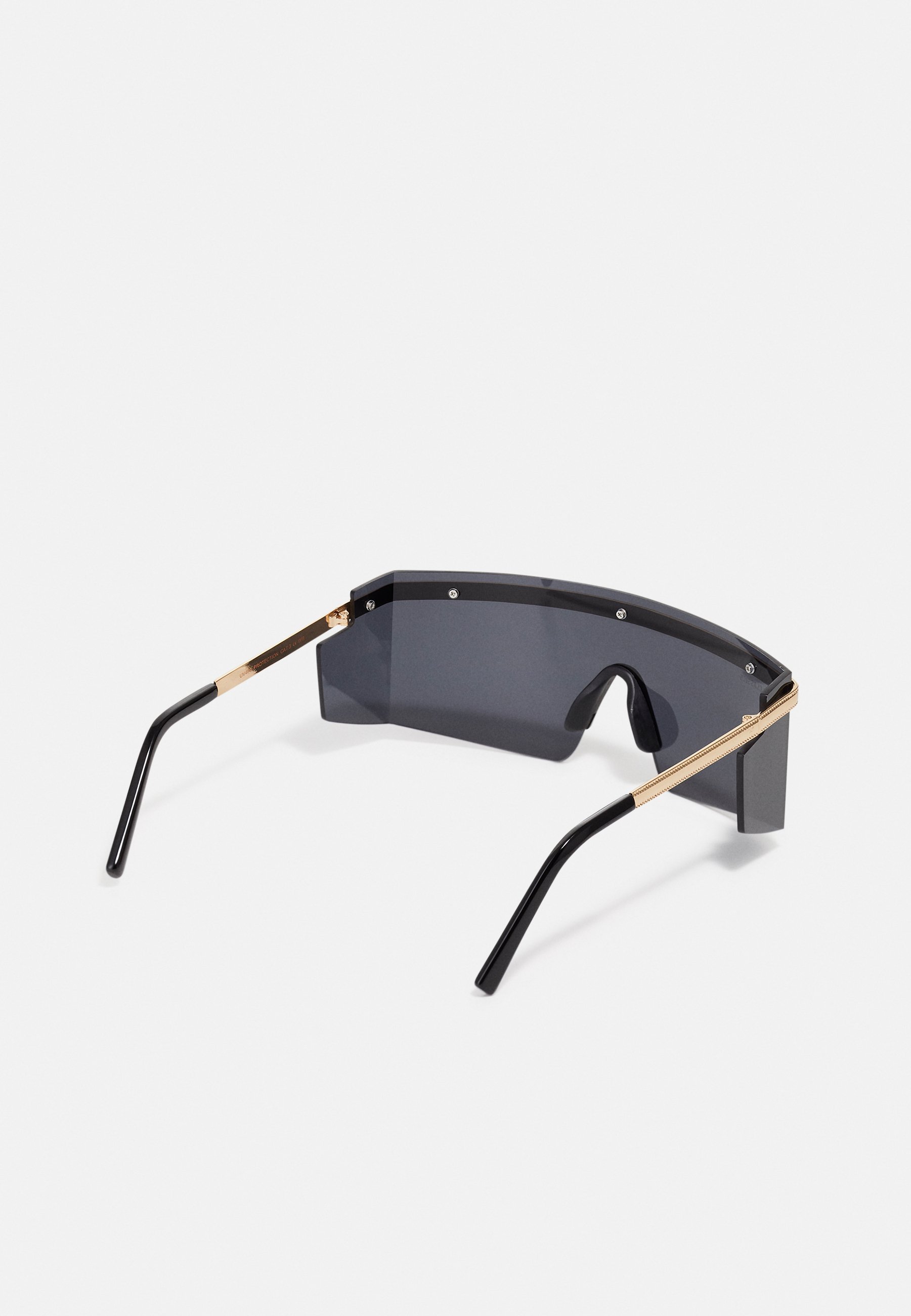Lunettes de soleil Urban Classics SARDINIA - noires et dorées