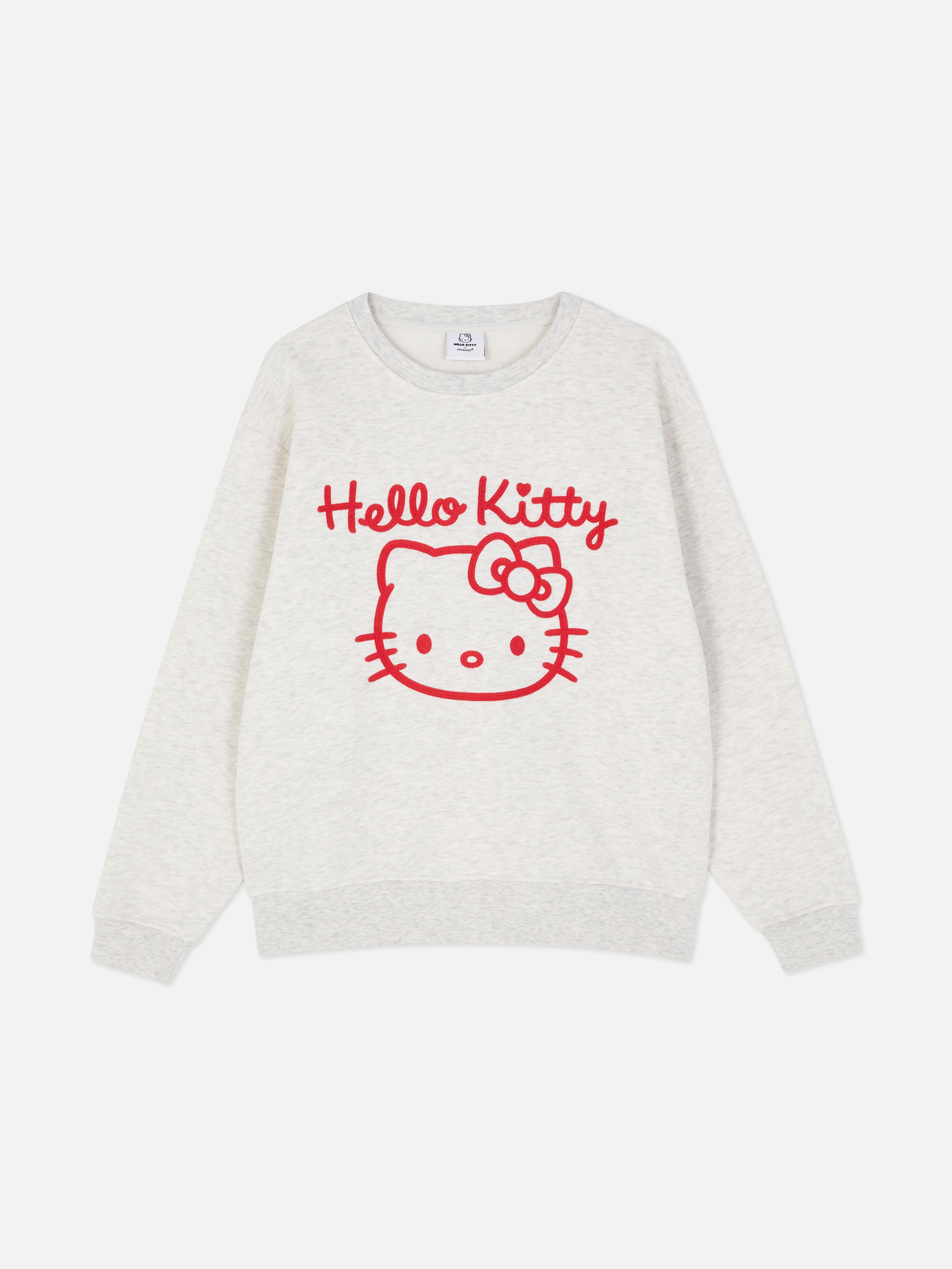 Hanorac cu imprimeu Hello Kitty Un hanorac cu umeri căzuți, manșete cu nervuri și imprimeu Hello Kitty