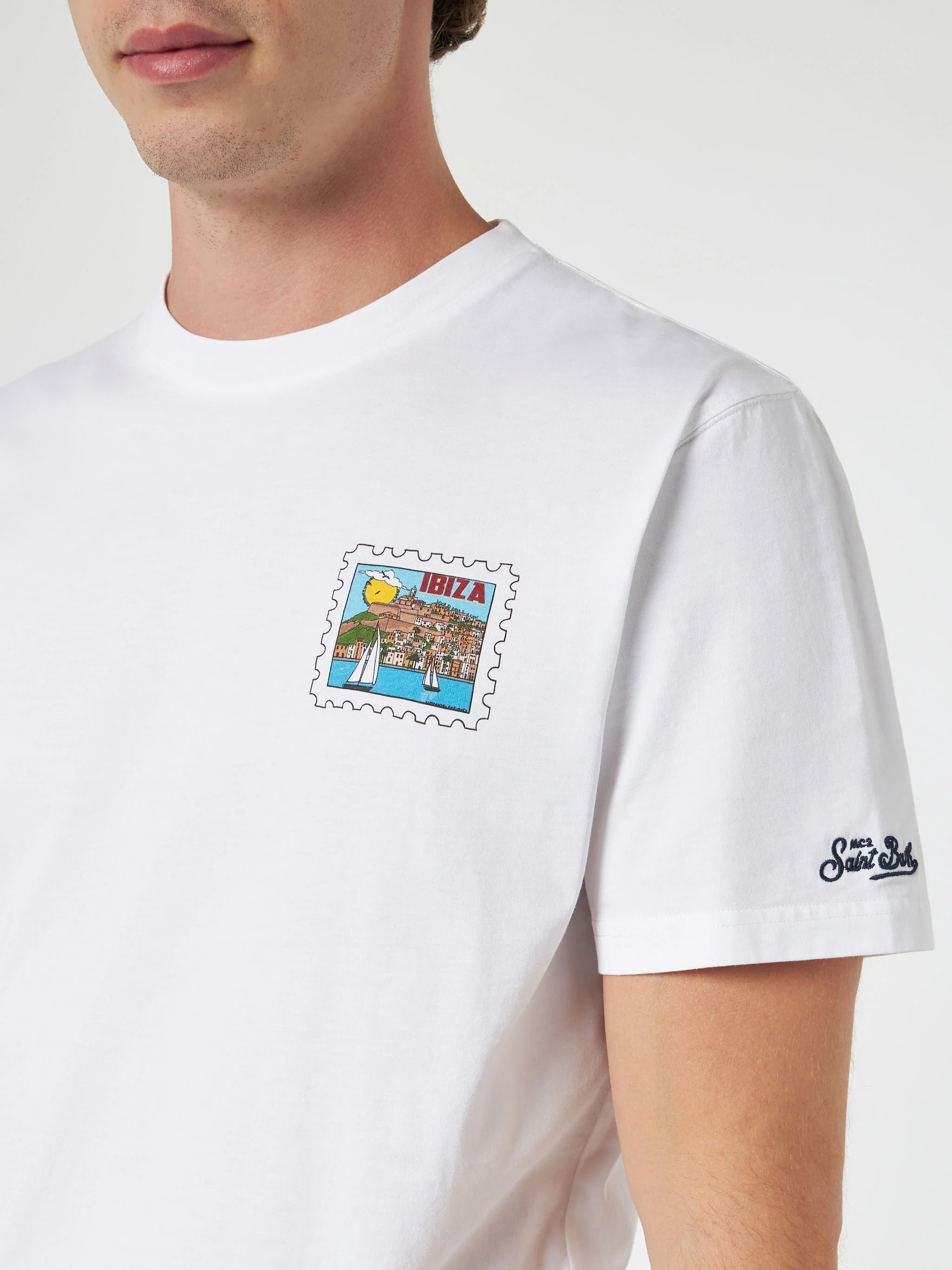 Heren katoenen T-shirt met Ibiza-ansichtkaartprint op voor- en achterkant.