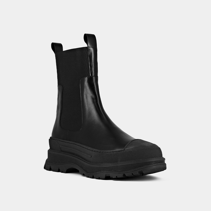Boots à semelles crantées  en cuir glacé noir