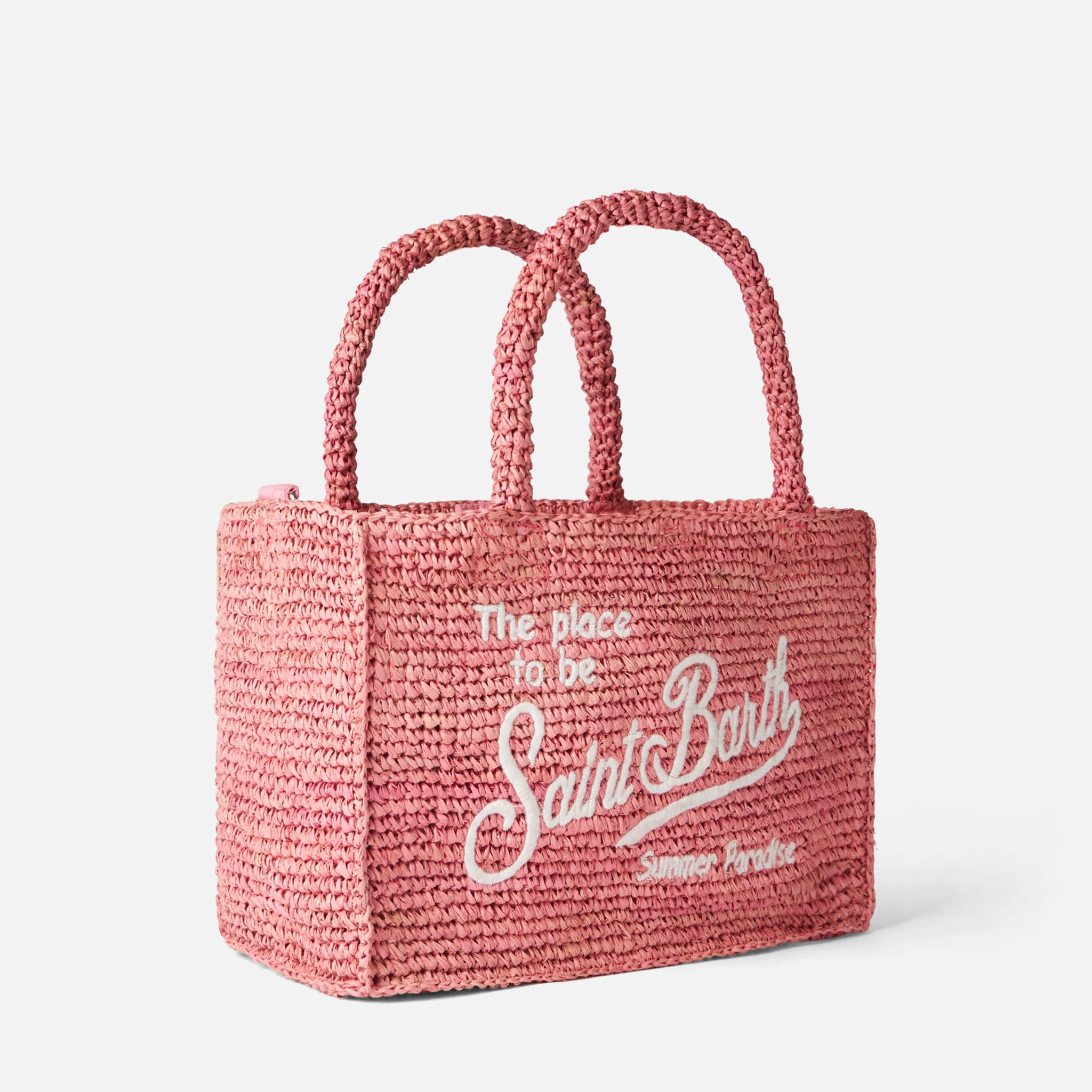 Colette-tas van roze raffia met Saint Barth-borduurwerk.