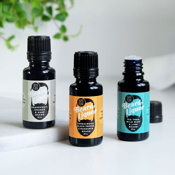 Liquore per barba Paper Plane al pompelmo, arancia e salvia 15 ml | Uomo | Superdrug