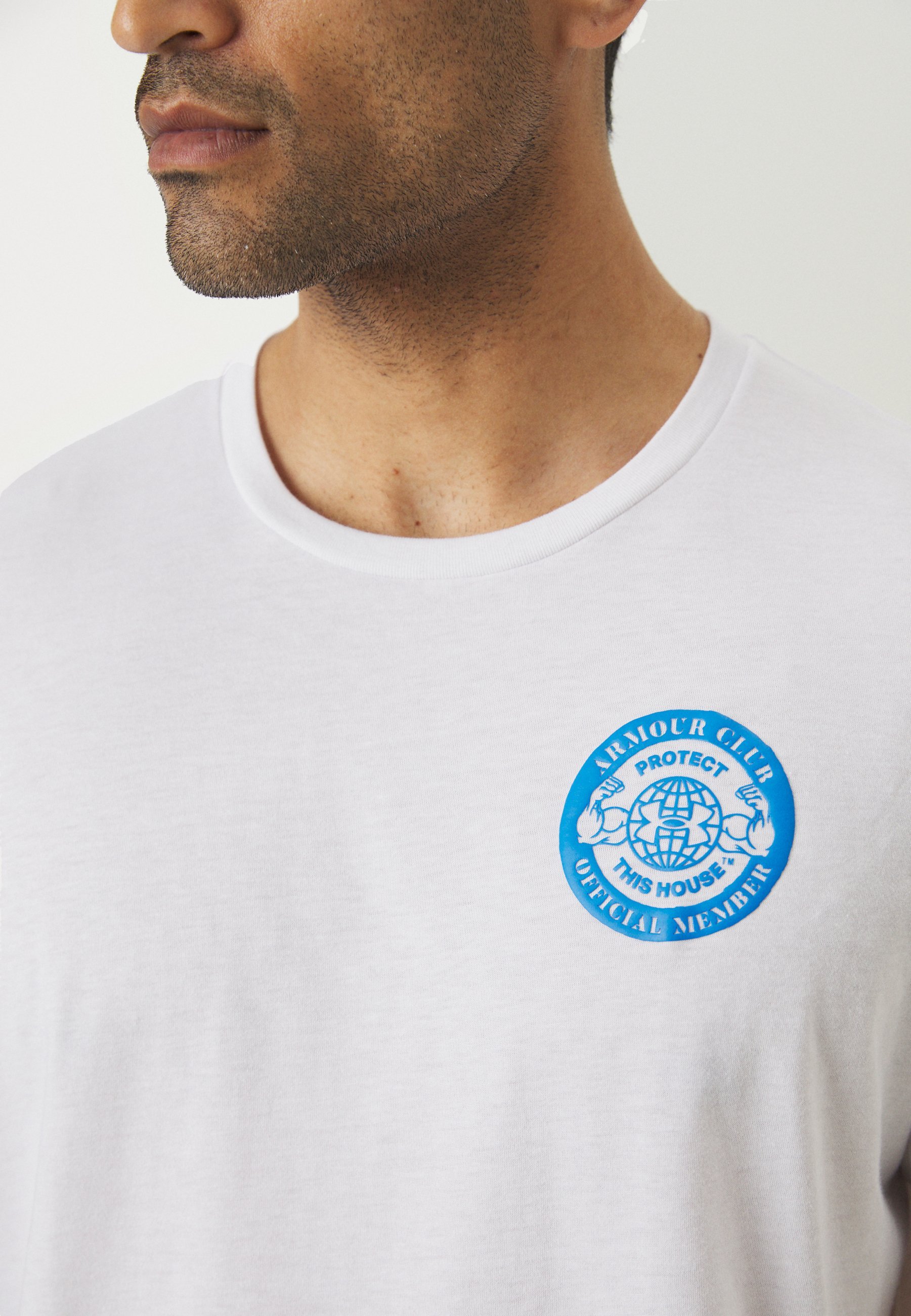 Under Armour CLUB - T-shirt met print - wit/blauw Atlantis