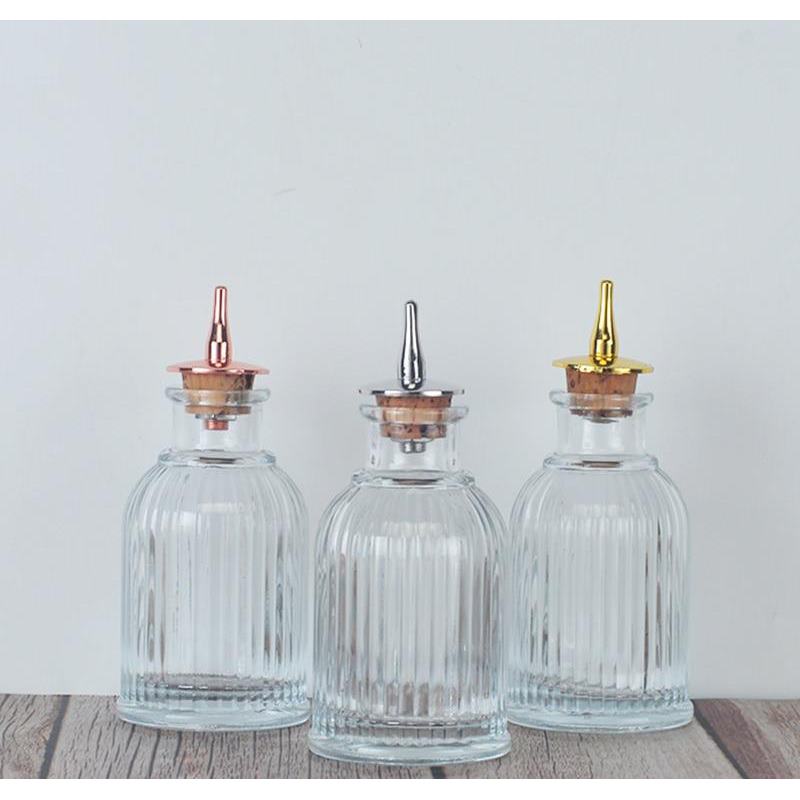 Bouteille en verre de 90 ml pour cocktails, avec bouchon doseur en acier inoxydable et design « cage à oiseaux », idéale pour les mixologues professionnels.