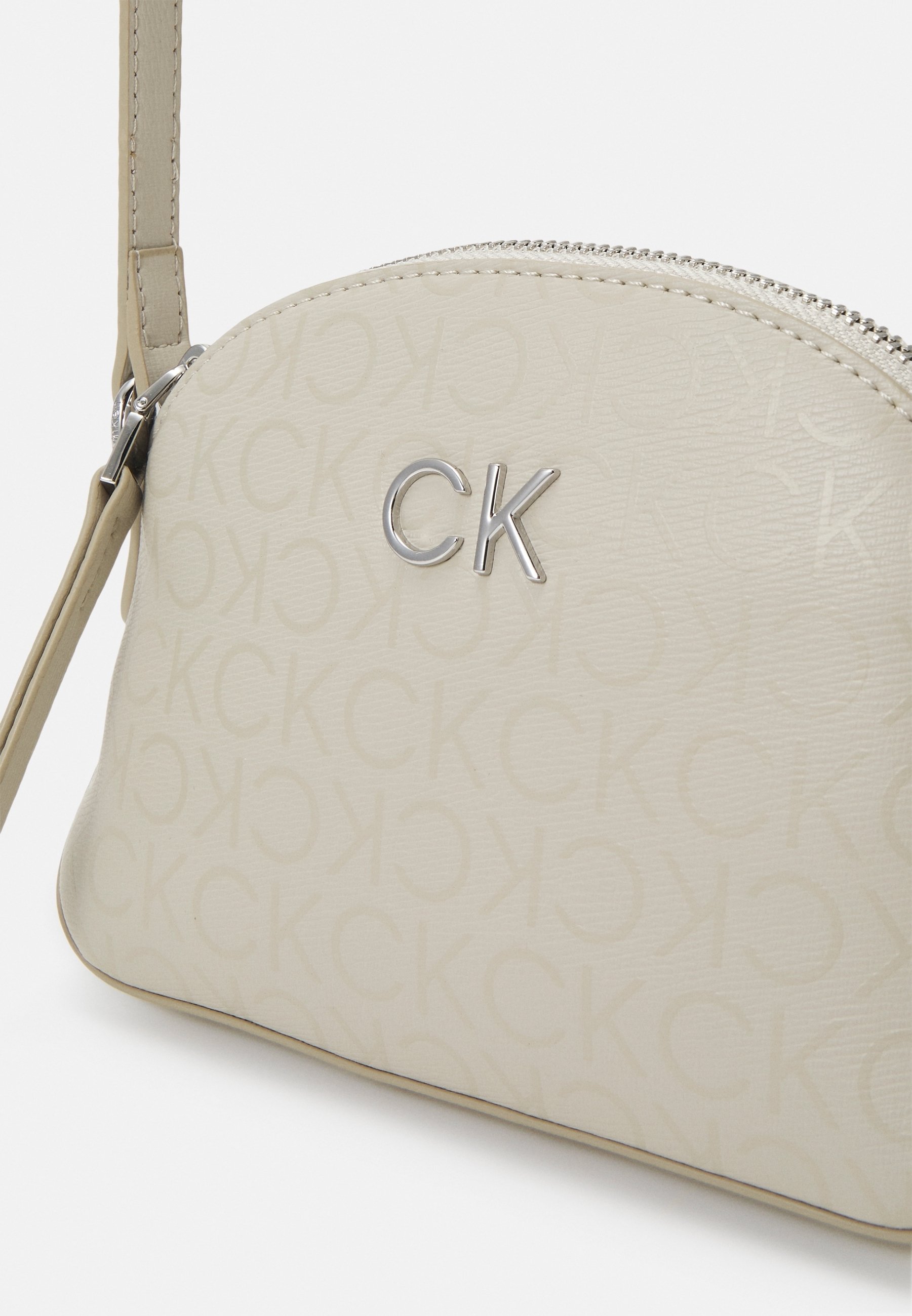 Calvin Klein Geantă crossbody - bej