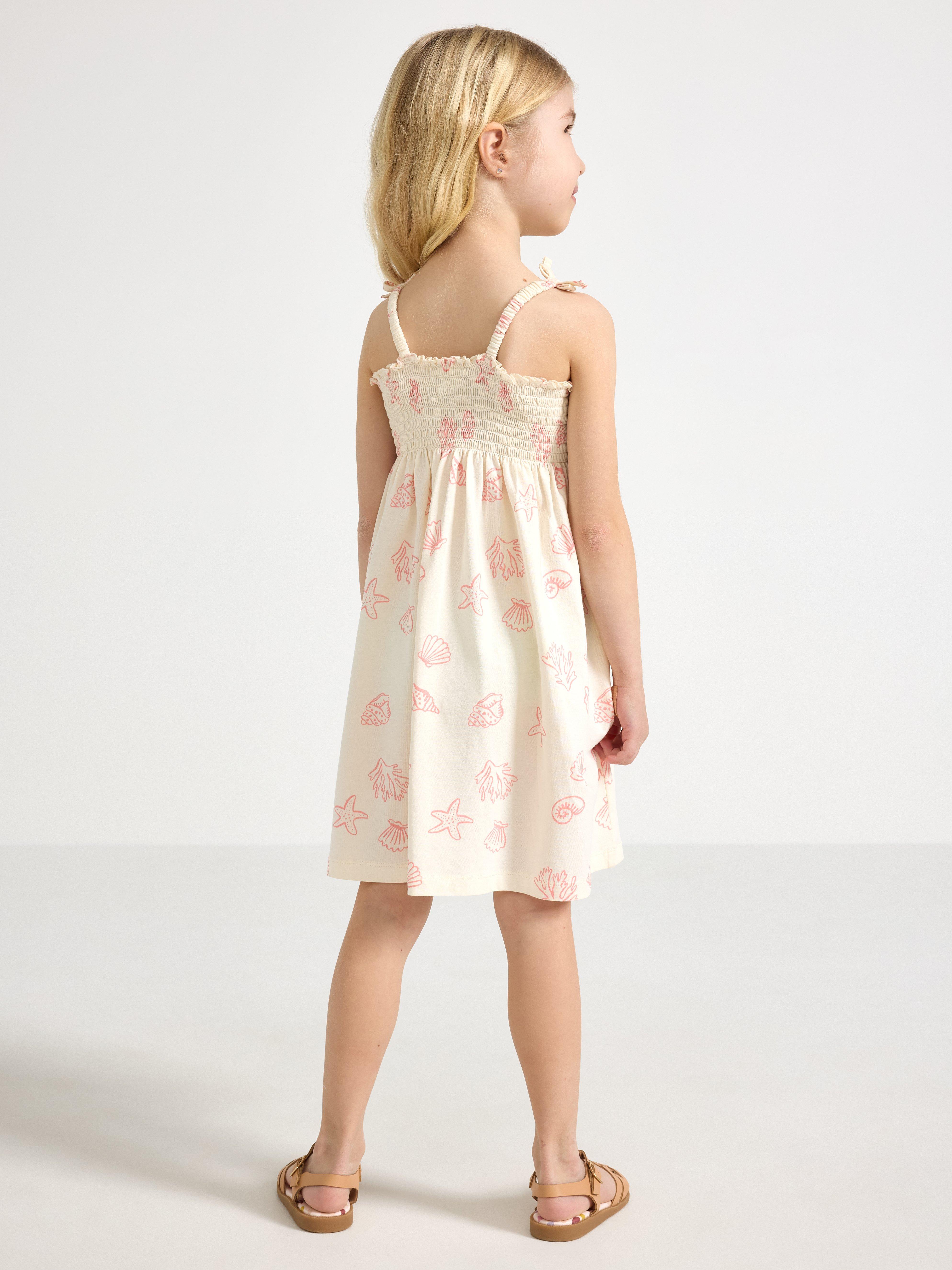 Robe blanche sans manches