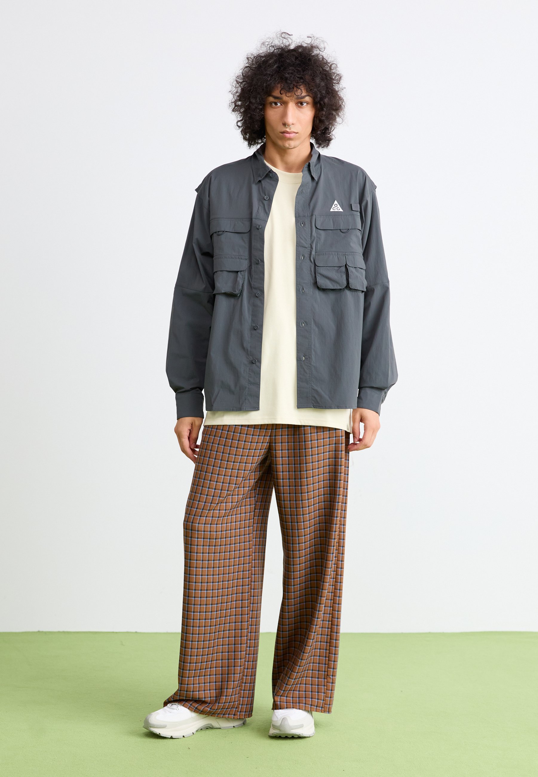 Přechodné bundy Nike ACG