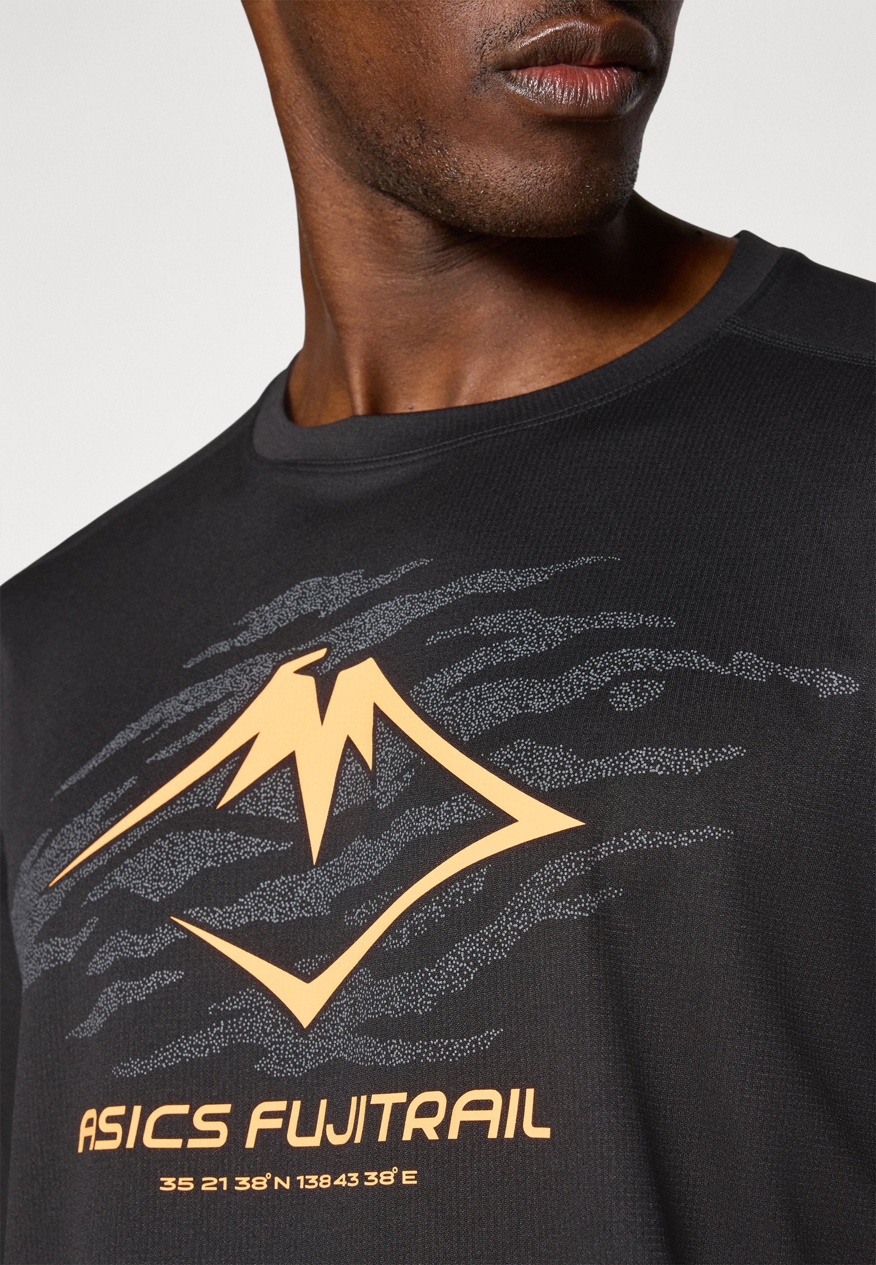 Haut ASICS FUJITRAIL LOGO - Manches longues - Noir performance
